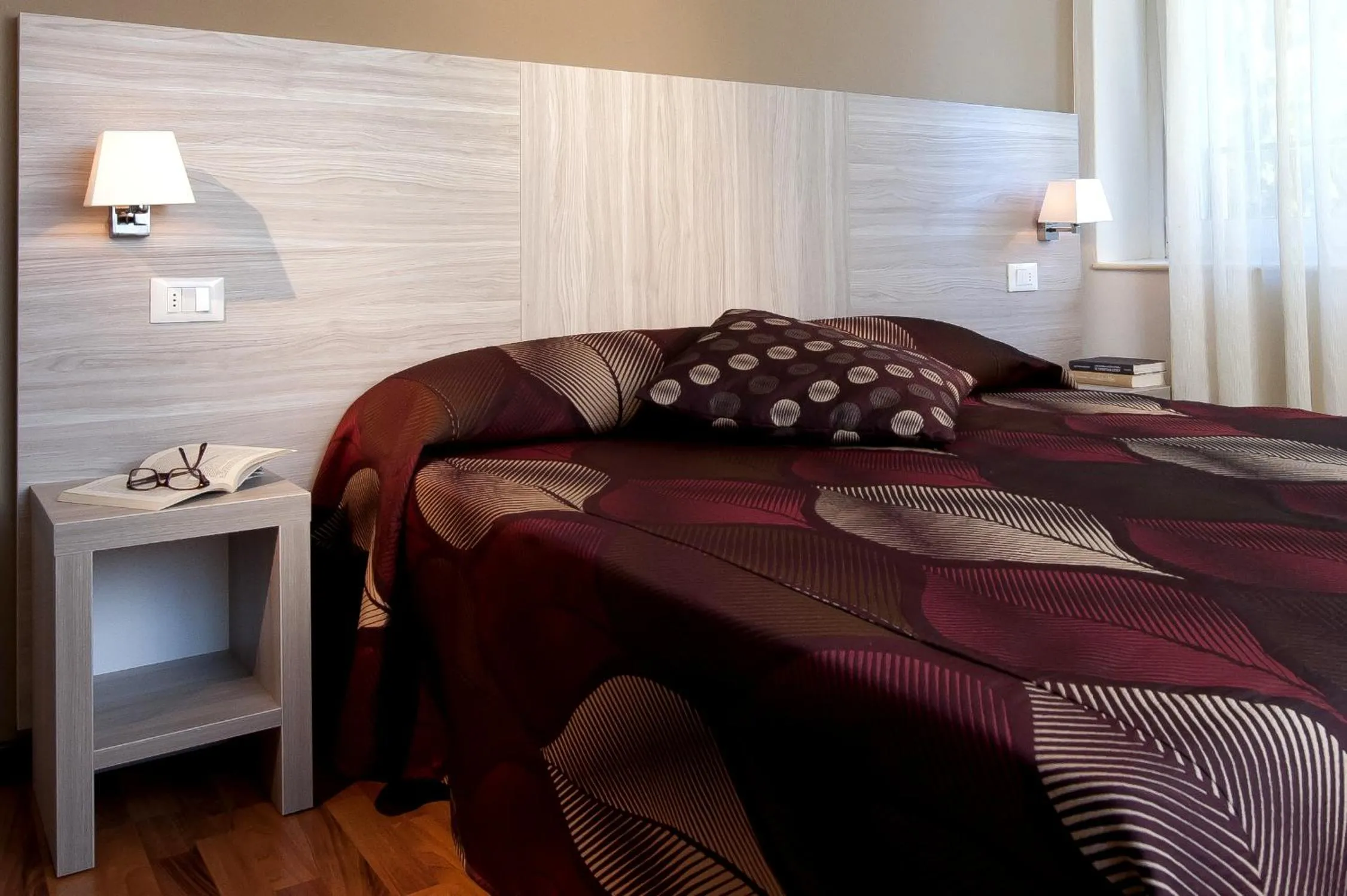 Bed in Albergo Valentina