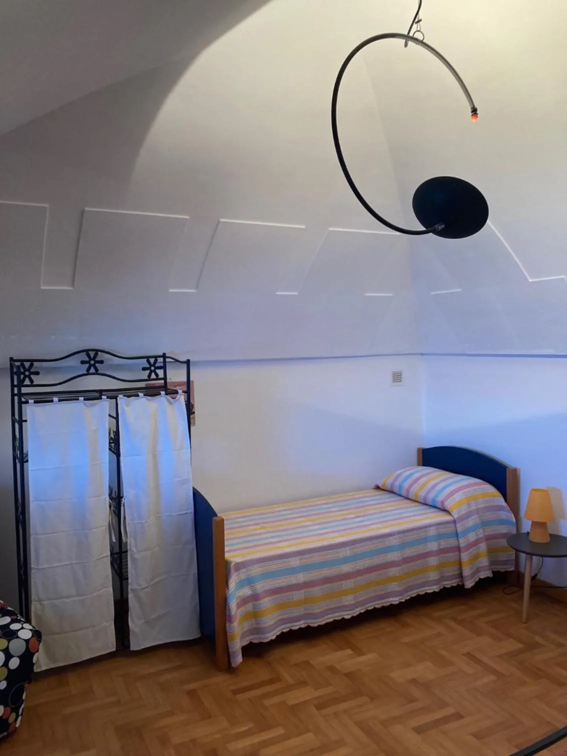 Bed in Tolomei House Holidays Sea View