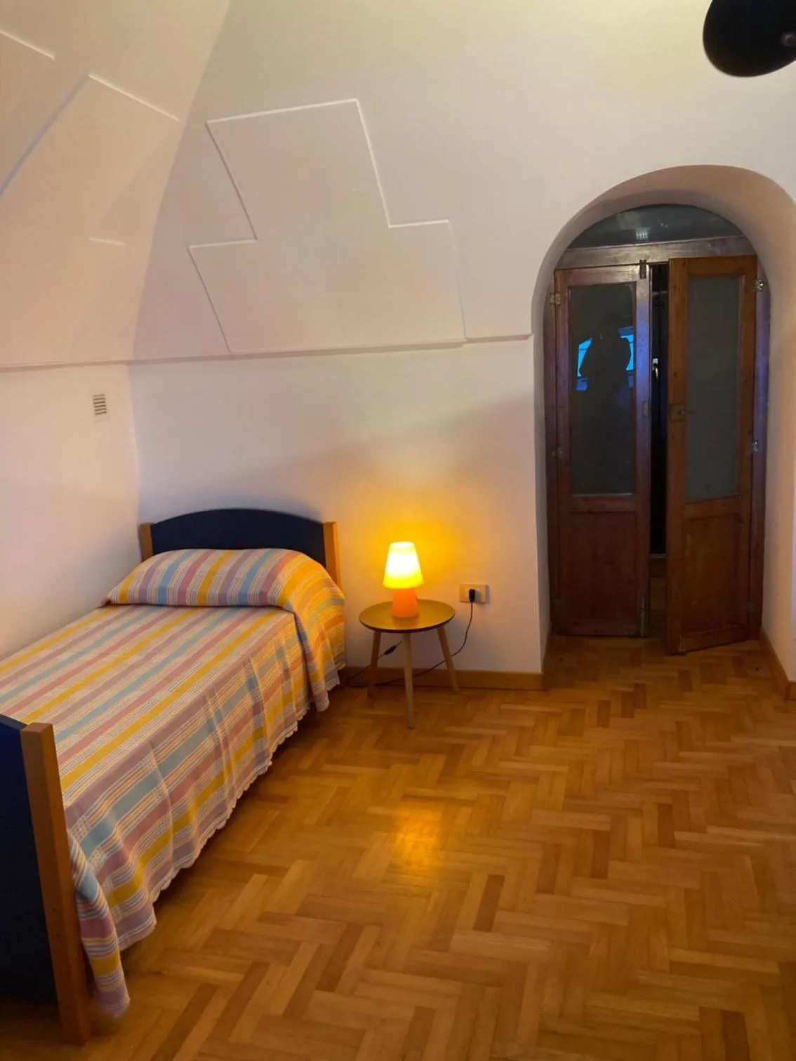 Bed in Tolomei House Holidays Sea View