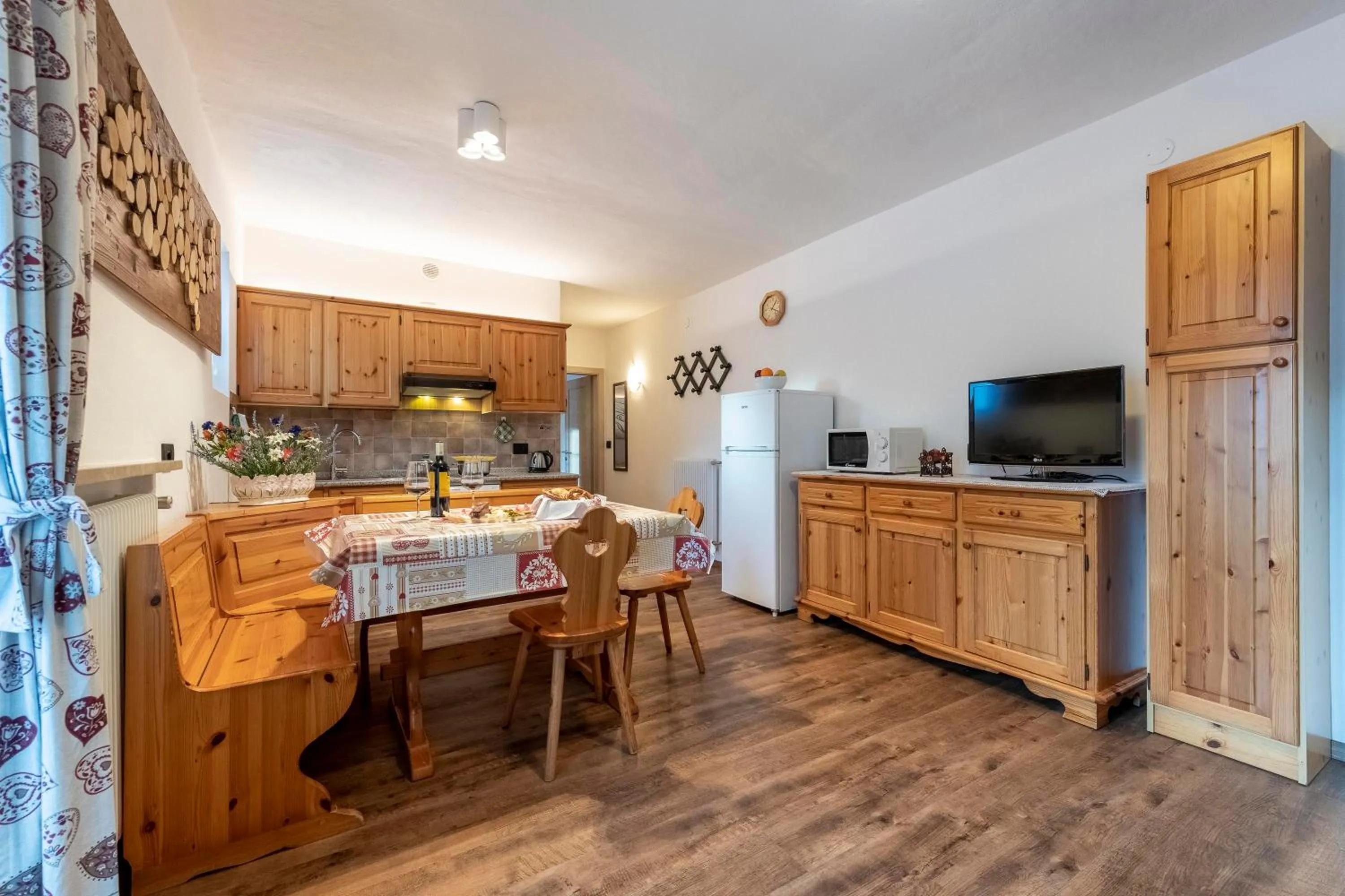 Kitchen or kitchenette in Appartamenti Residence La Roggia