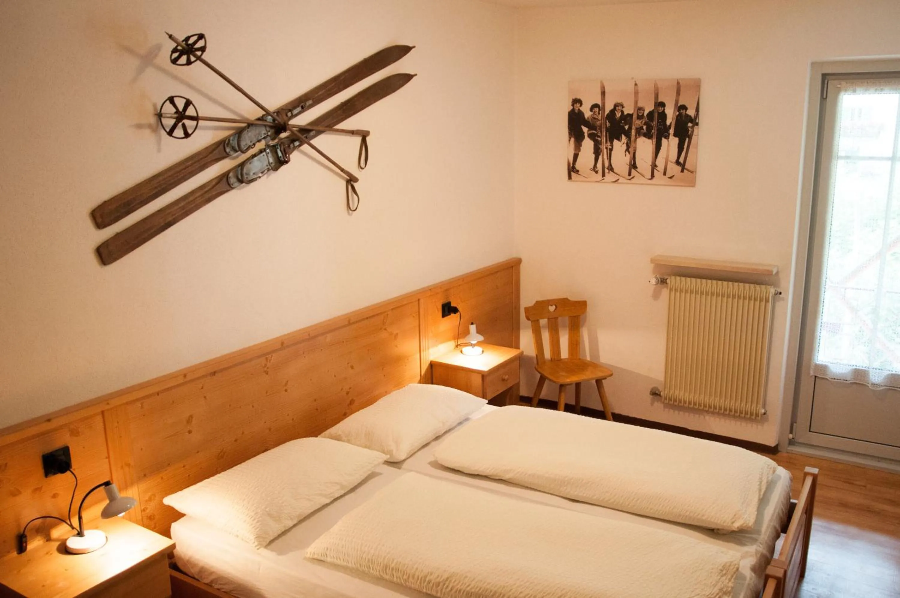 Bed in Appartamenti Residence La Roggia