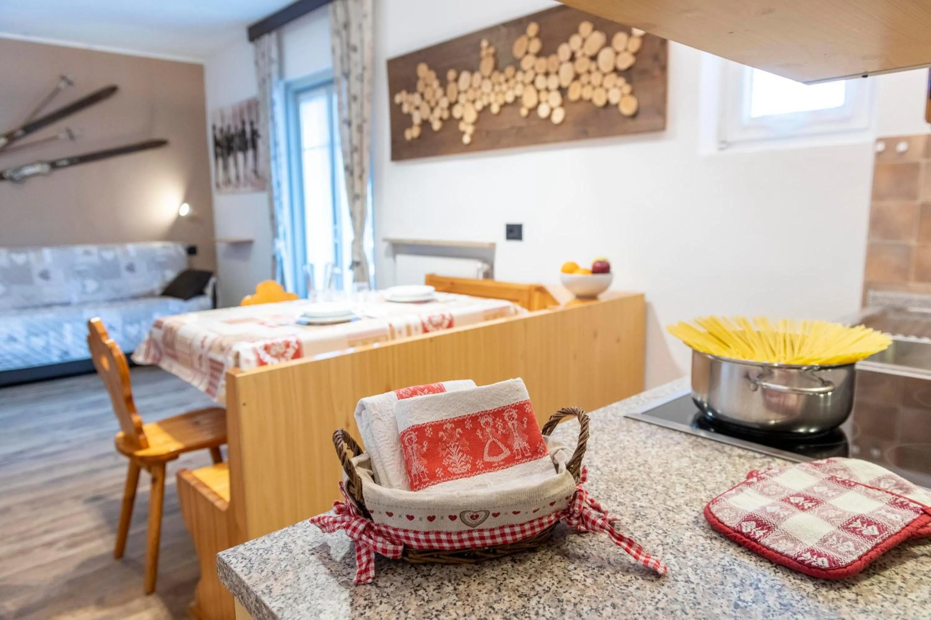 Kitchen or kitchenette, Bed in Appartamenti Residence La Roggia