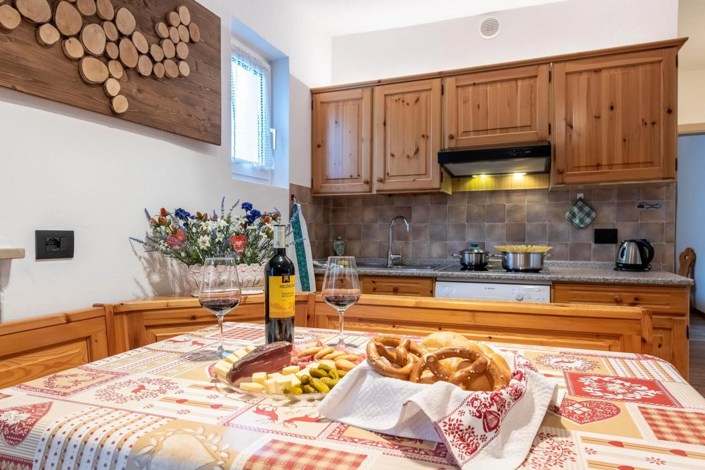 Kitchen or kitchenette in Appartamenti Residence La Roggia