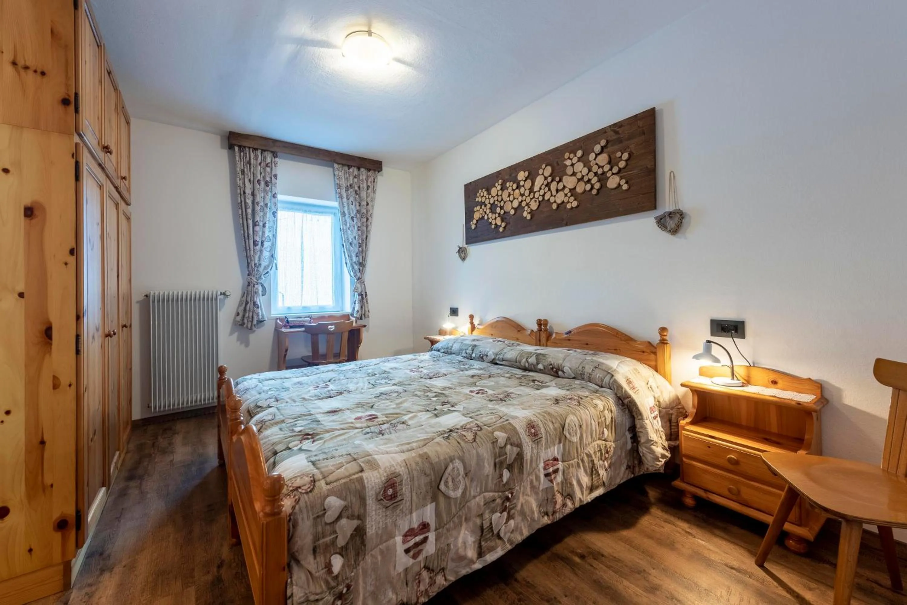 Bed in Appartamenti Residence La Roggia