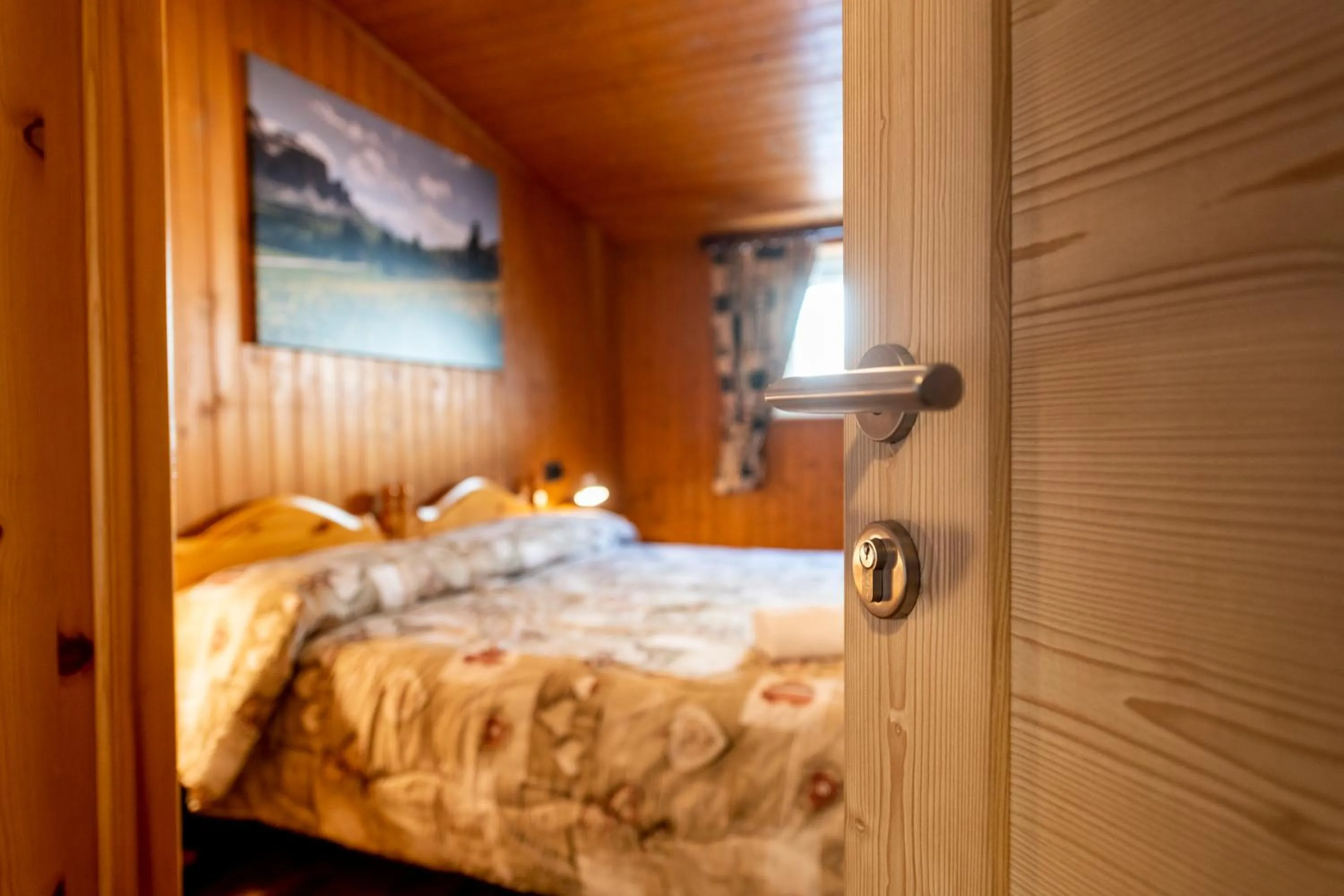 Bed in Appartamenti Residence La Roggia