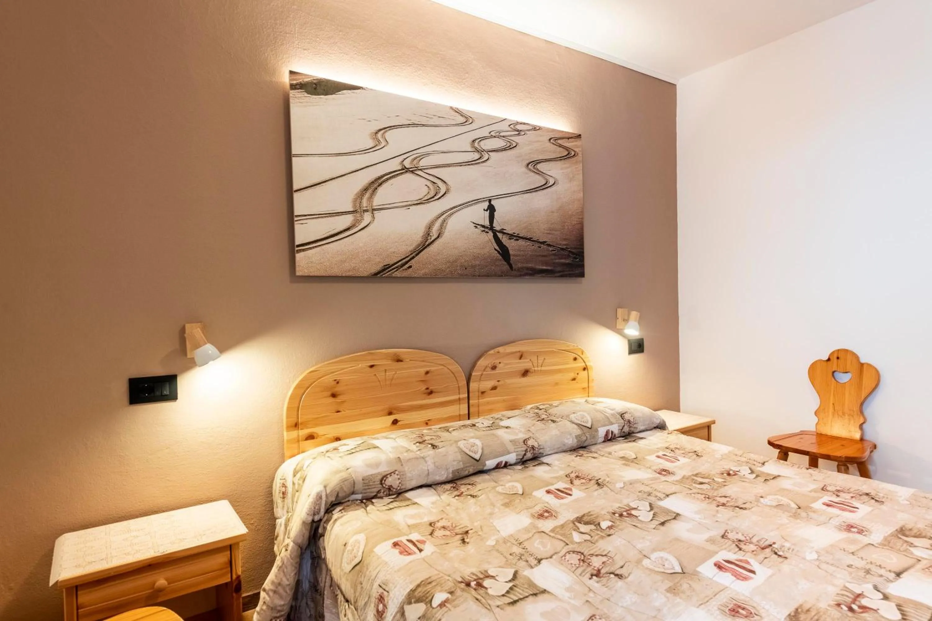 Bed in Appartamenti Residence La Roggia