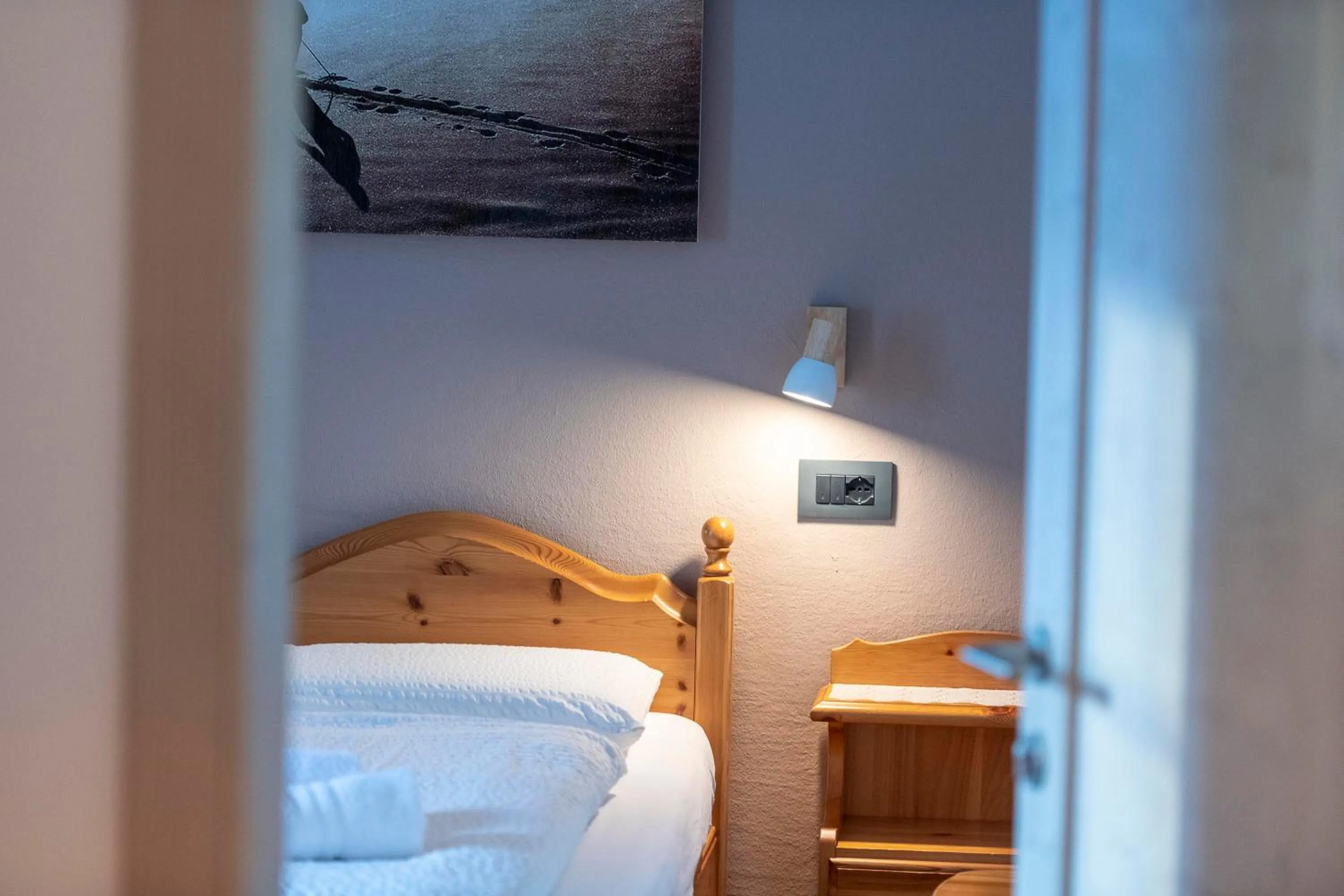 Bed in Appartamenti Residence La Roggia