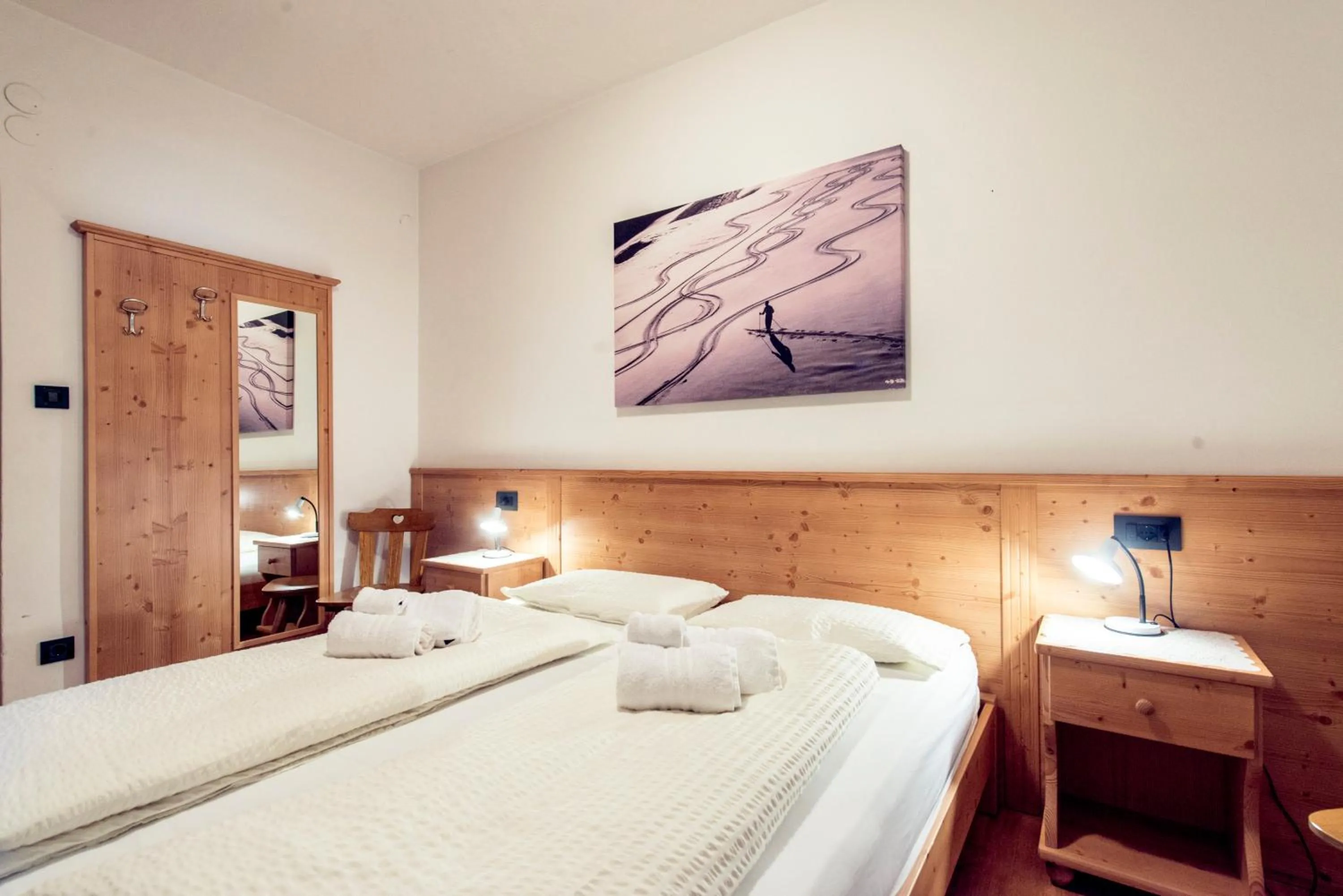 Bed in Appartamenti Residence La Roggia