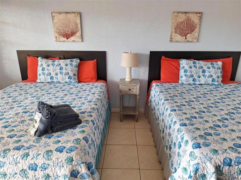 Bed in Blind Pass Resort Motel