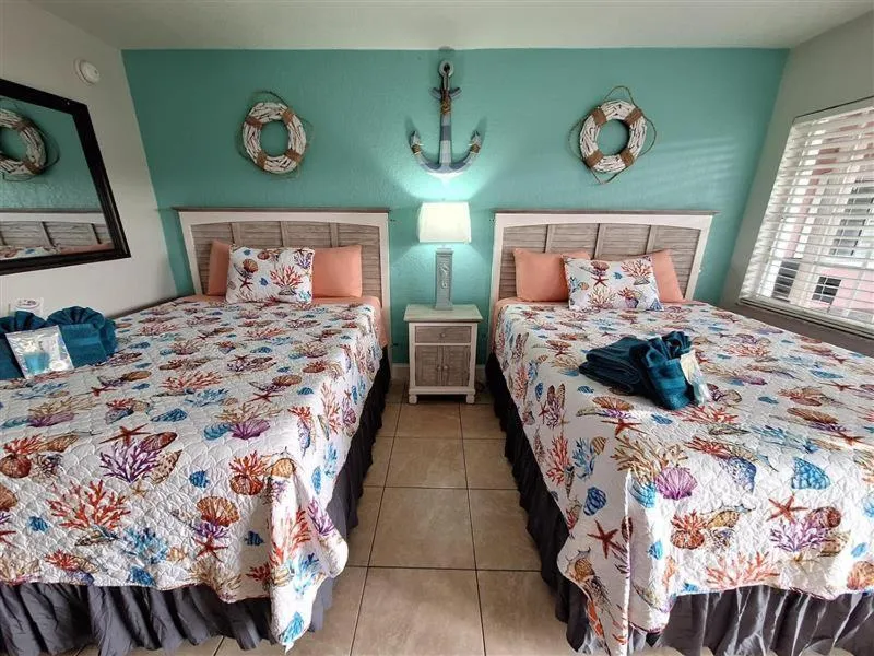 Bed in Blind Pass Resort Motel