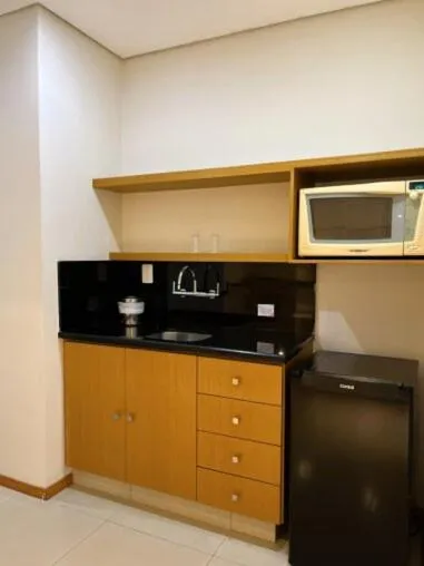 Le Village Flats e Hotel