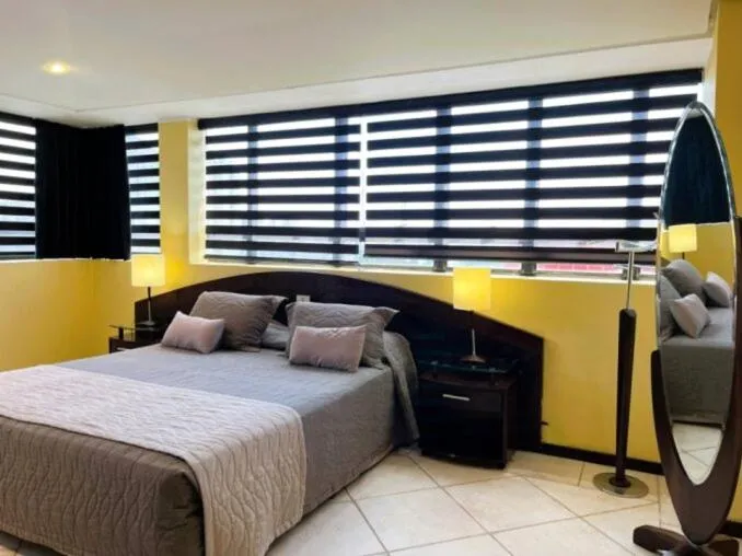 Bed in Le Village Flats e Hotel