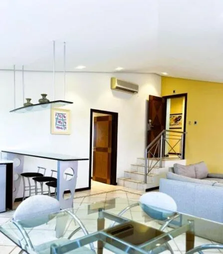 Le Village Flats e Hotel