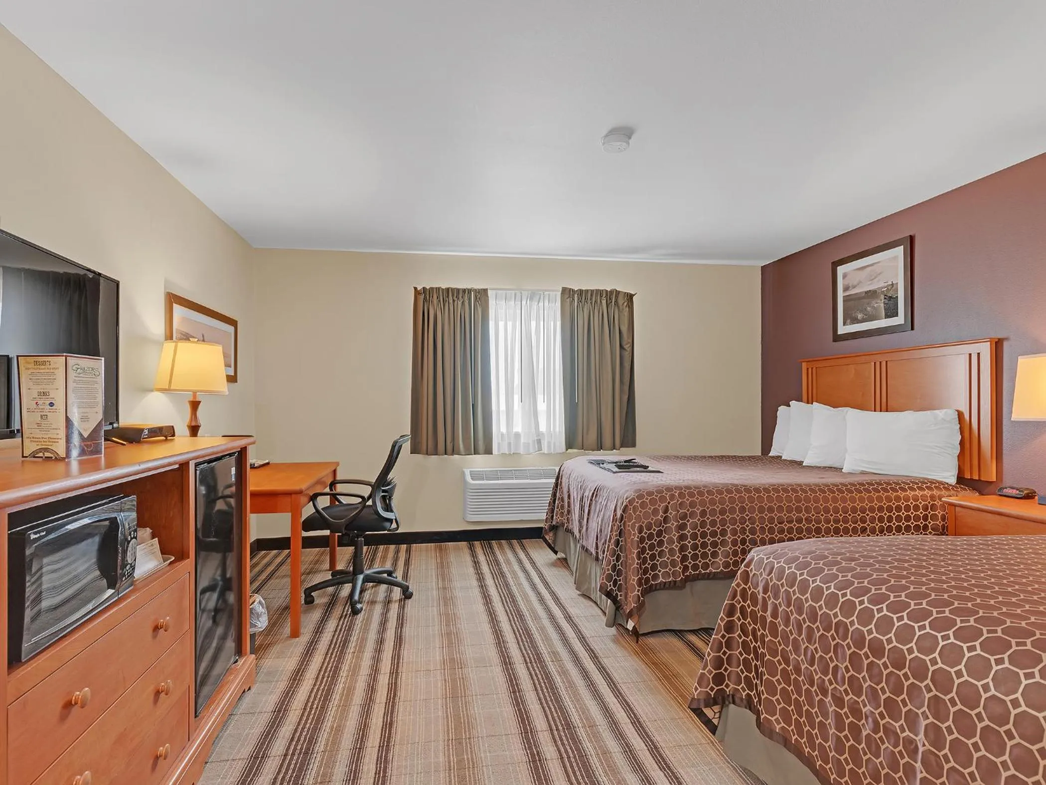 Bed in Bowman Lodge & Convention Center