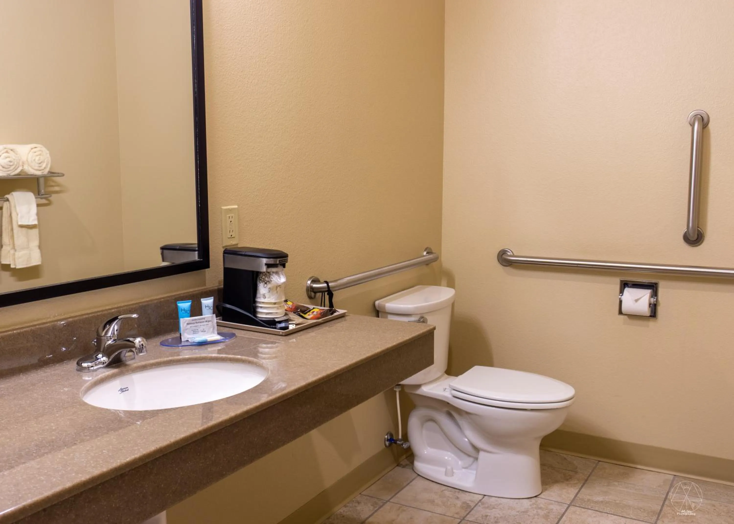 Toilet in Bowman Lodge & Convention Center