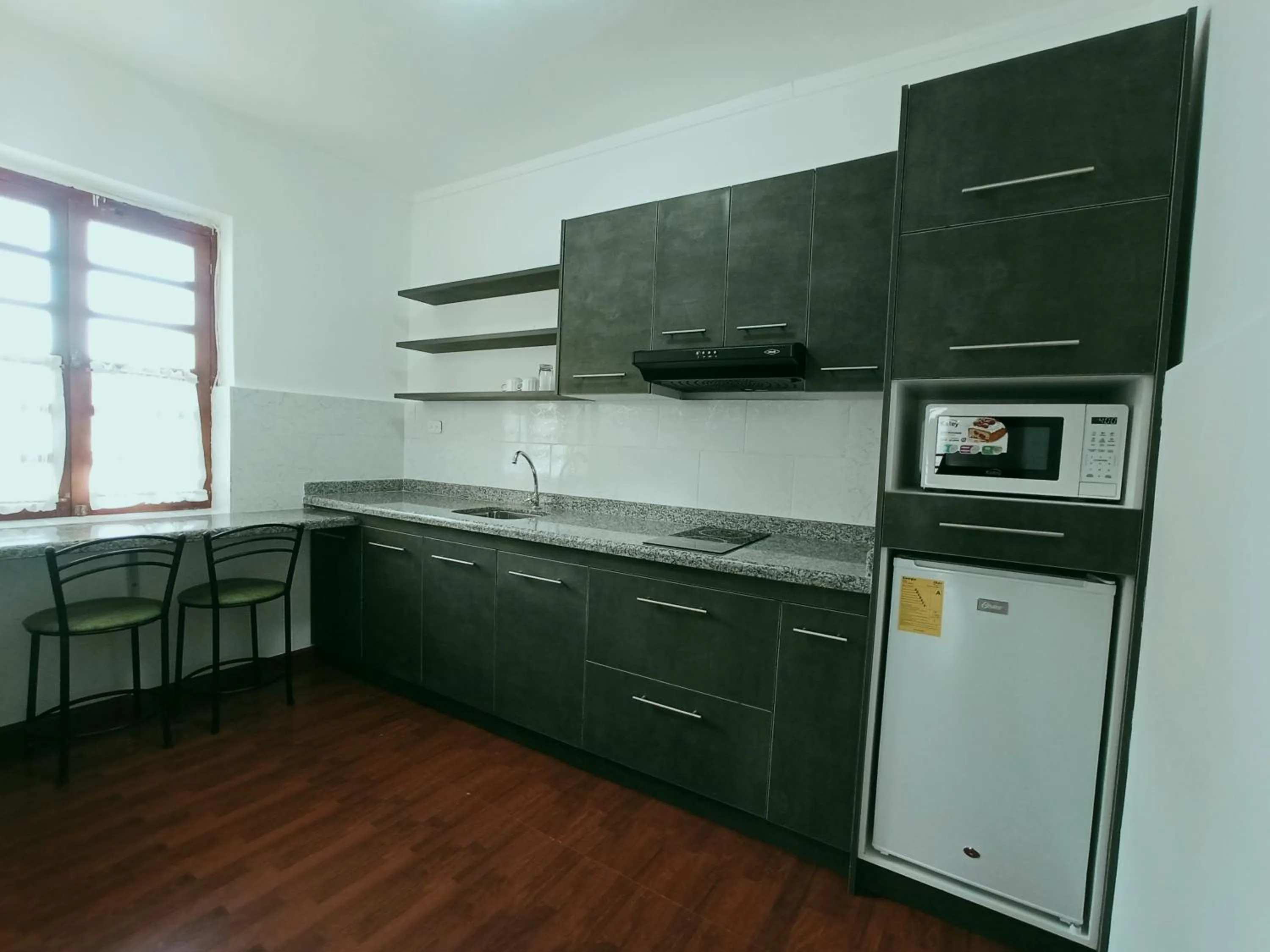 Kitchen or kitchenette in Hotel + Arte