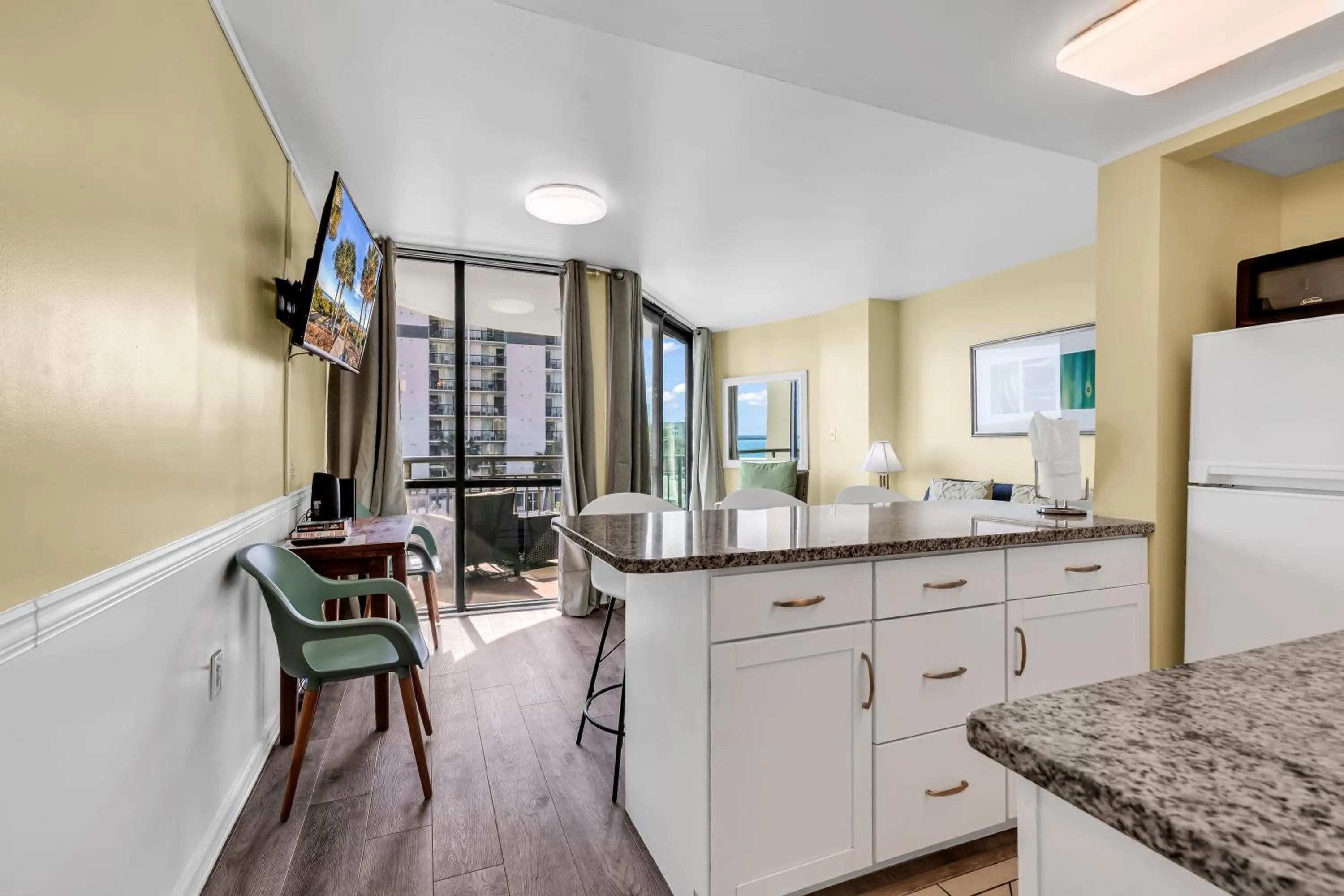 Kitchen or kitchenette in Oceanfront condo Steps to the beach w No Resort Fees