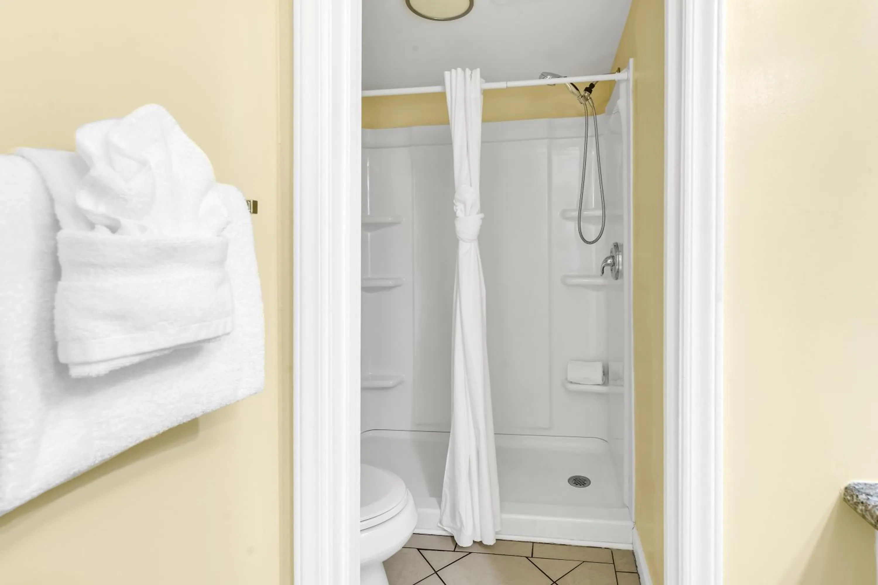 Bathroom in Oceanfront condo Steps to the beach w No Resort Fees