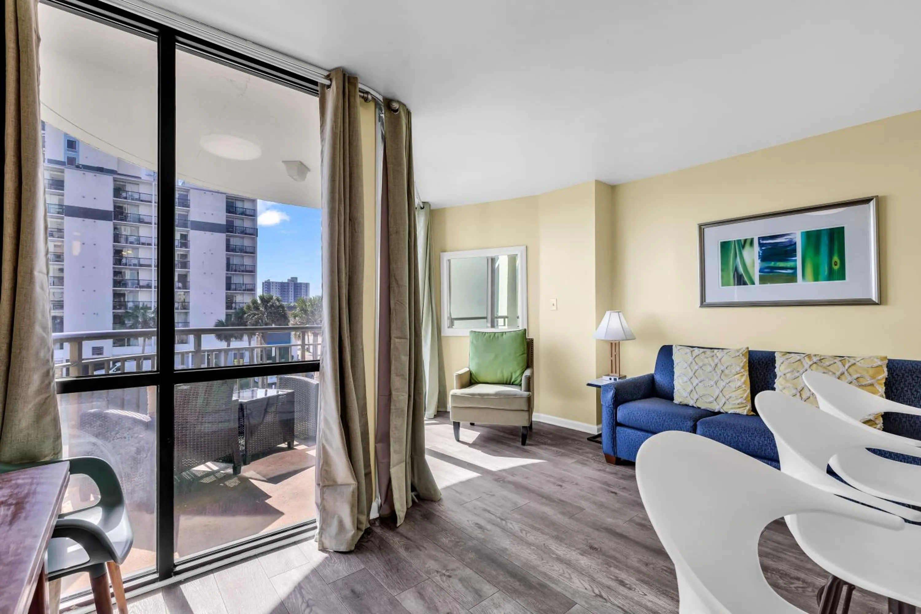 Living room in Oceanfront condo Steps to the beach w No Resort Fees