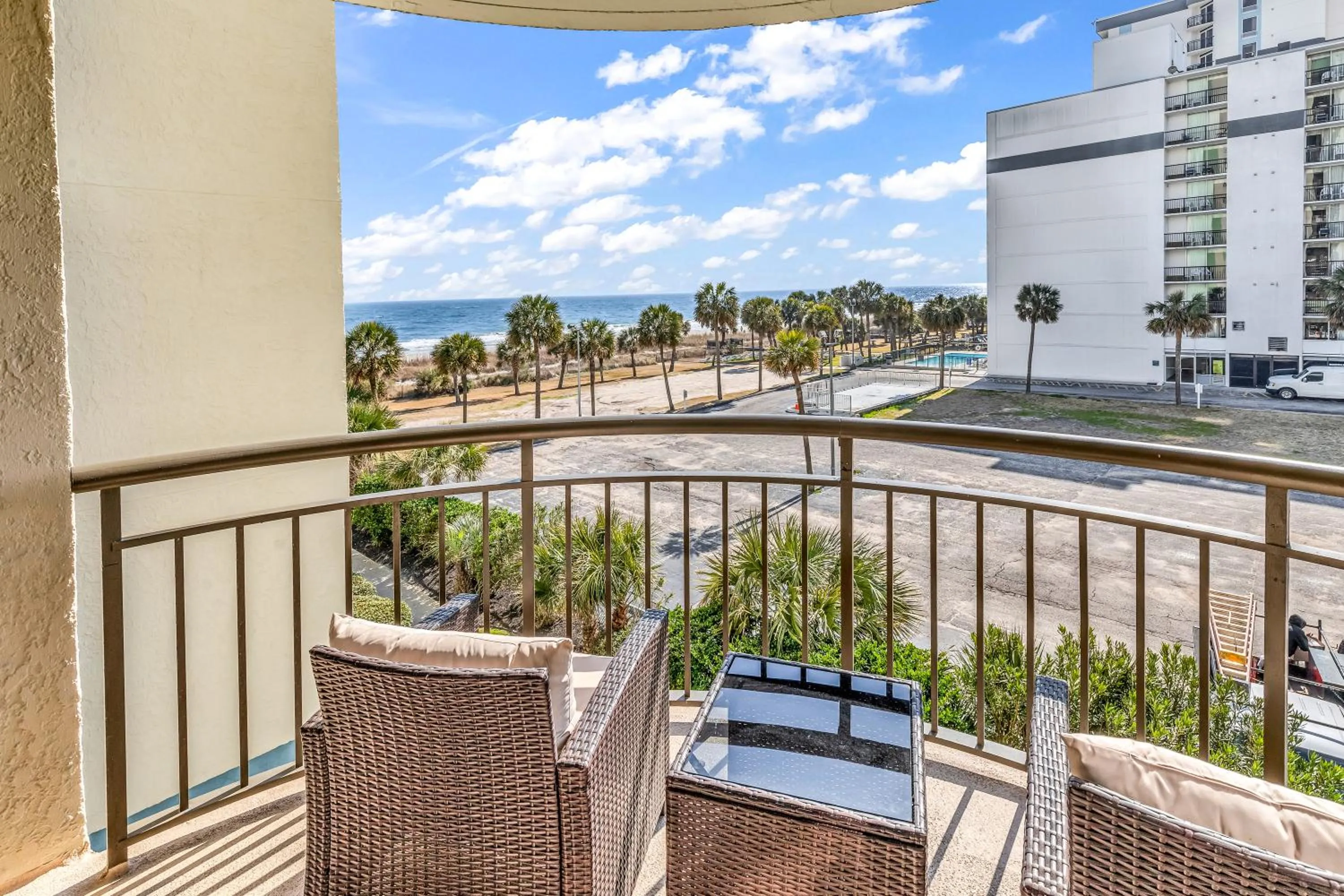Balcony/Terrace in Oceanfront condo Steps to the beach w No Resort Fees