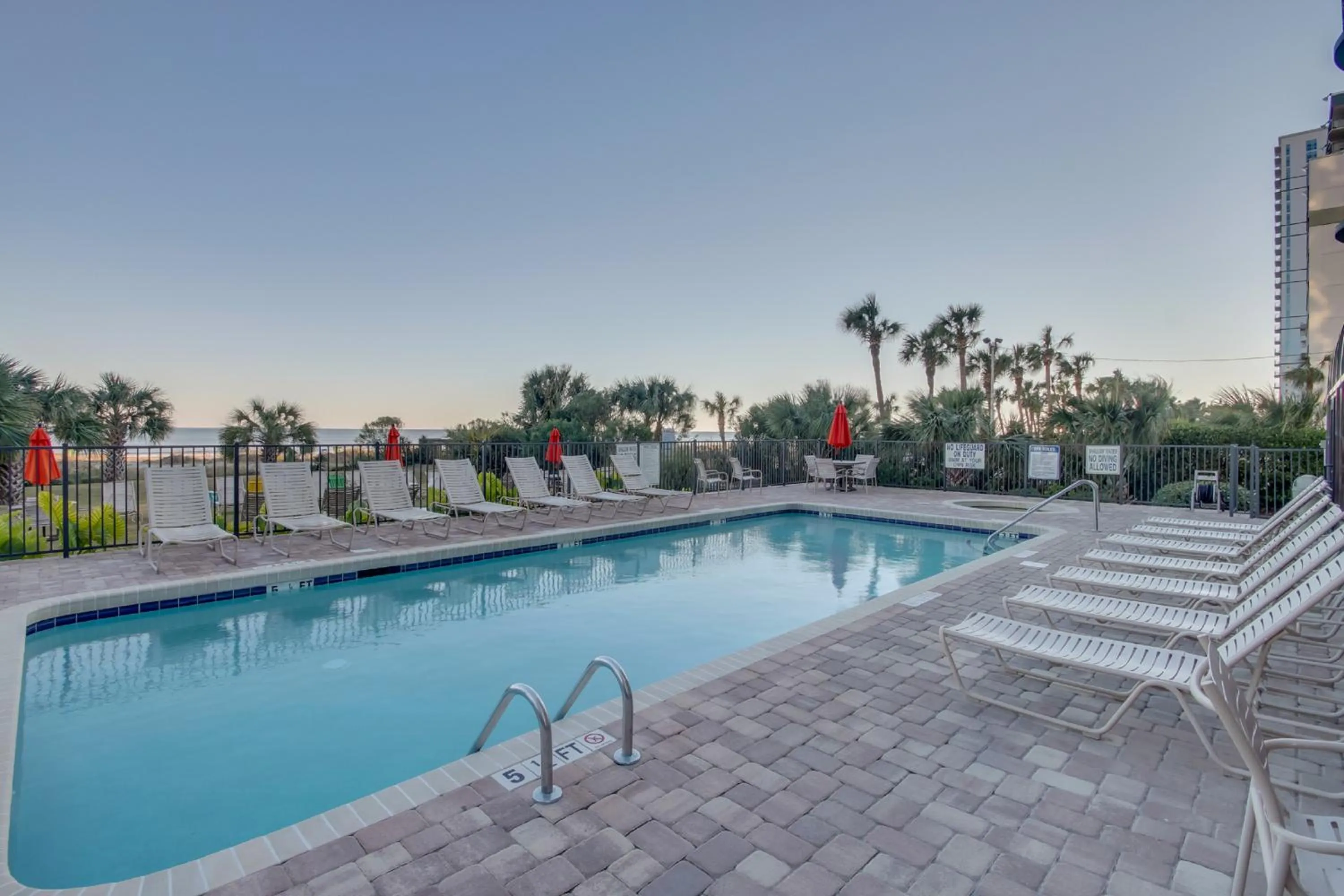 Swimming pool in Oceanfront condo Steps to the beach w No Resort Fees