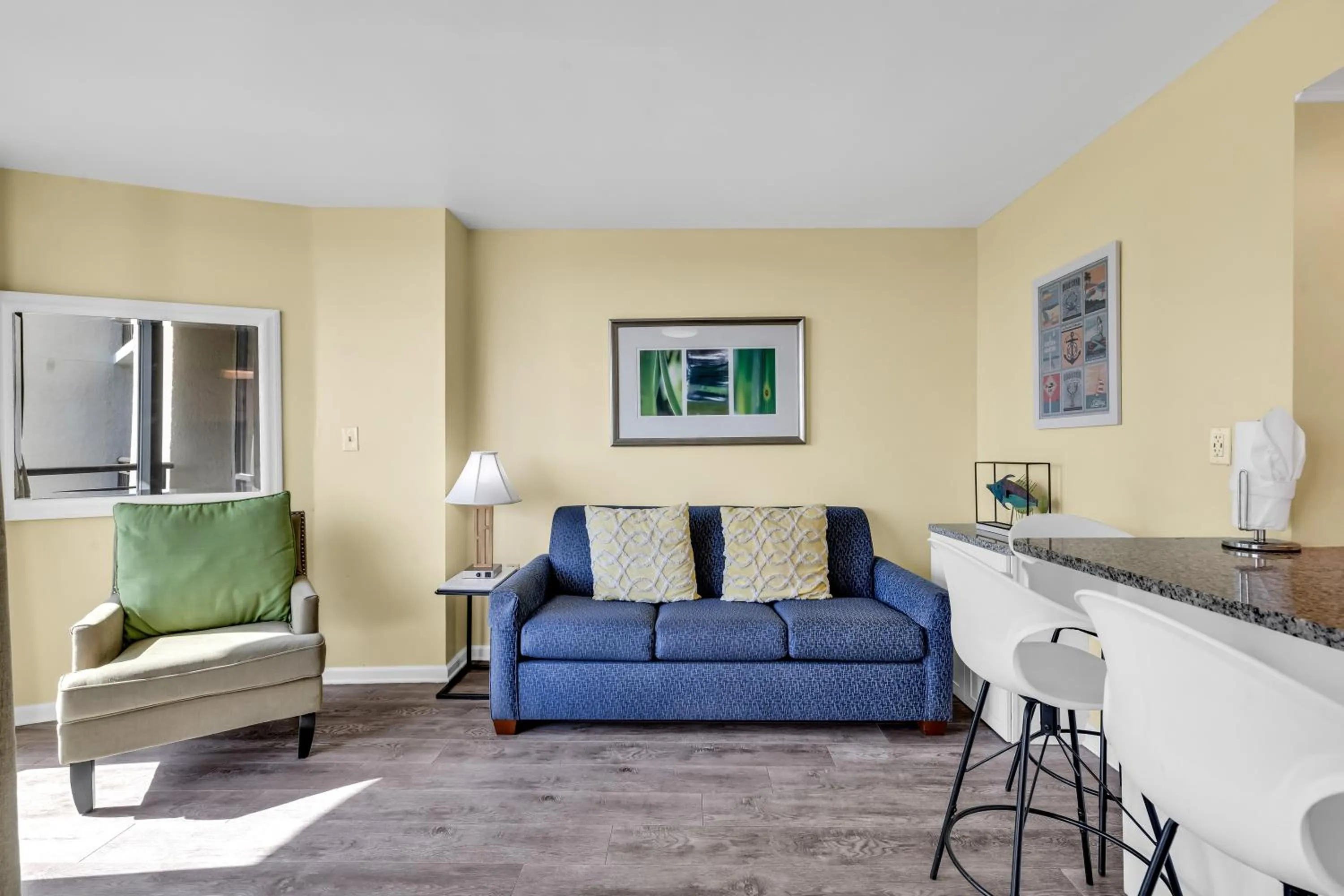 Living room in Oceanfront condo Steps to the beach w No Resort Fees