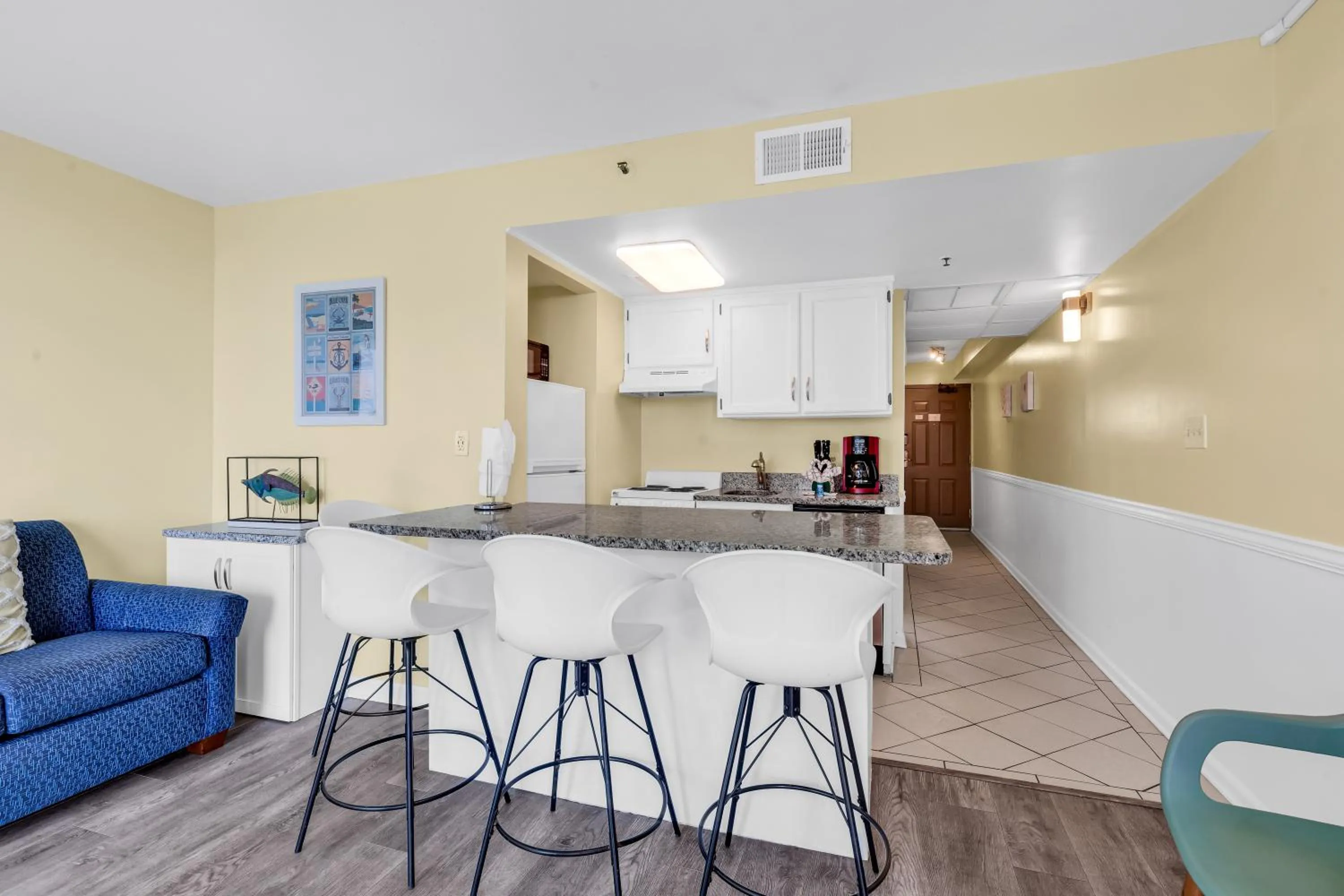 Kitchen or kitchenette in Oceanfront condo Steps to the beach w No Resort Fees
