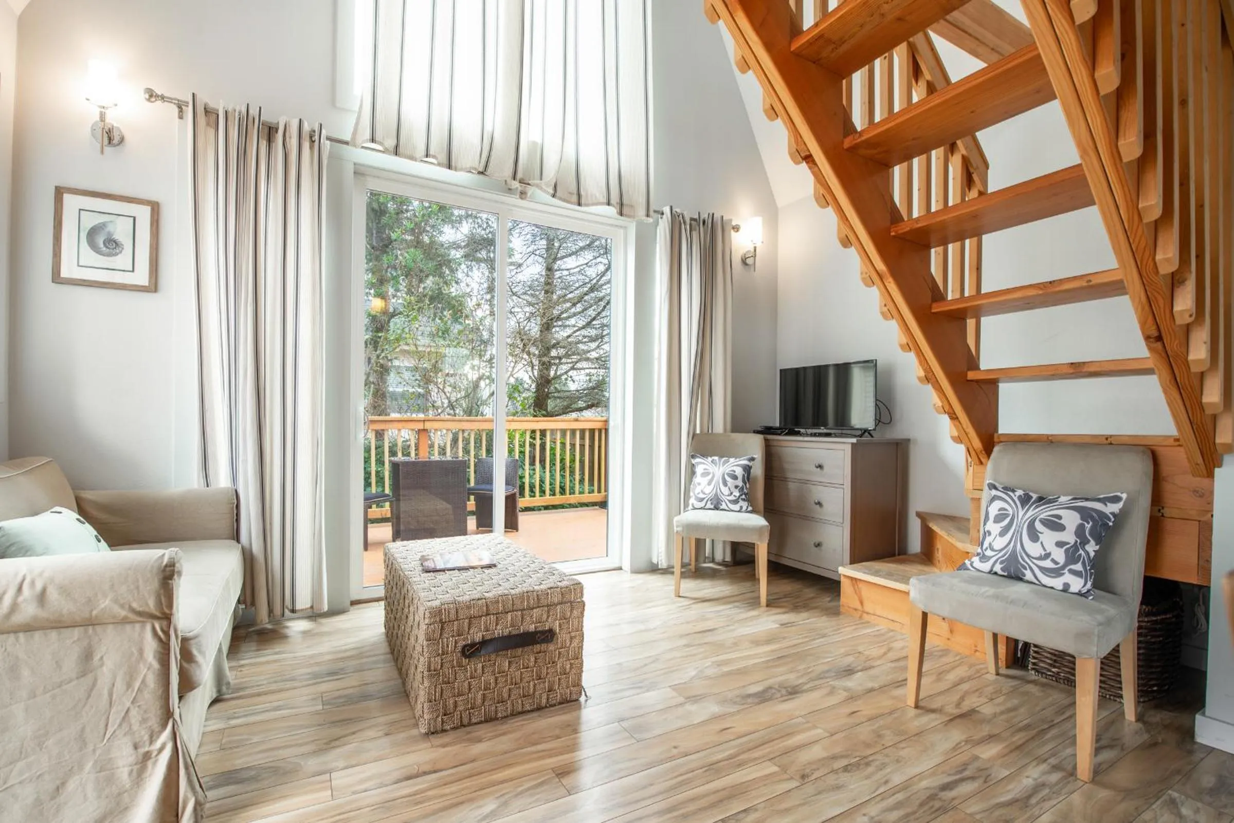 Seating area in Sea Breeze Cottages