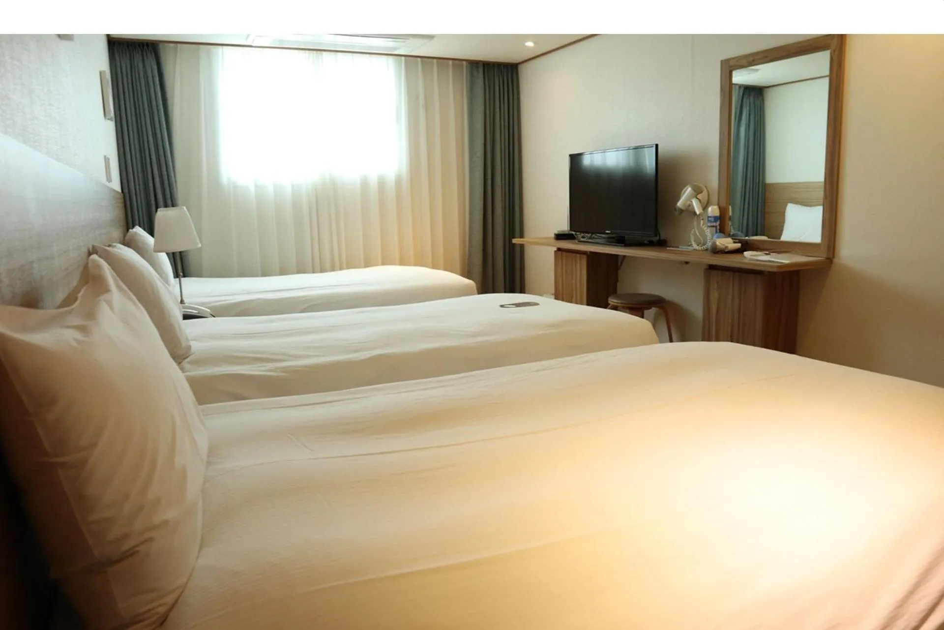 Photo of the whole room, Bed in Hotel Rest Seogwipo