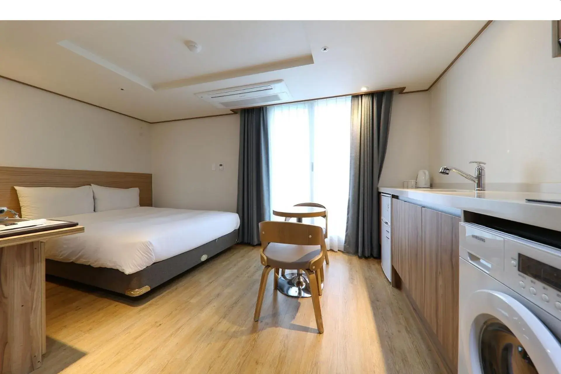 Photo of the whole room, Bed in Hotel Rest Seogwipo Photo of the whole room, Bed in Hotel Rest Seogwipo