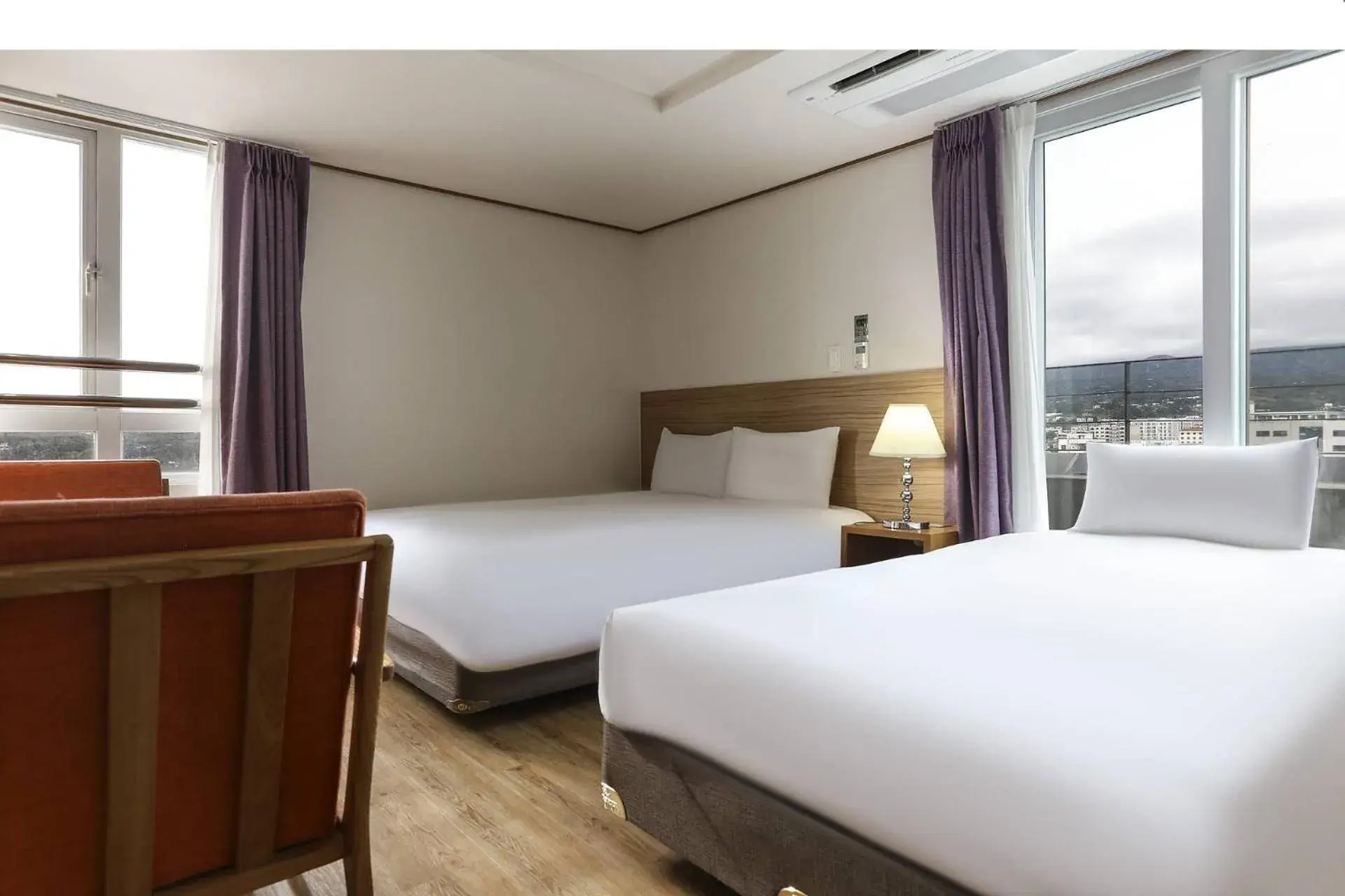 Photo of the whole room, Bed in Hotel Rest Seogwipo Photo of the whole room, Bed in Hotel Rest Seogwipo