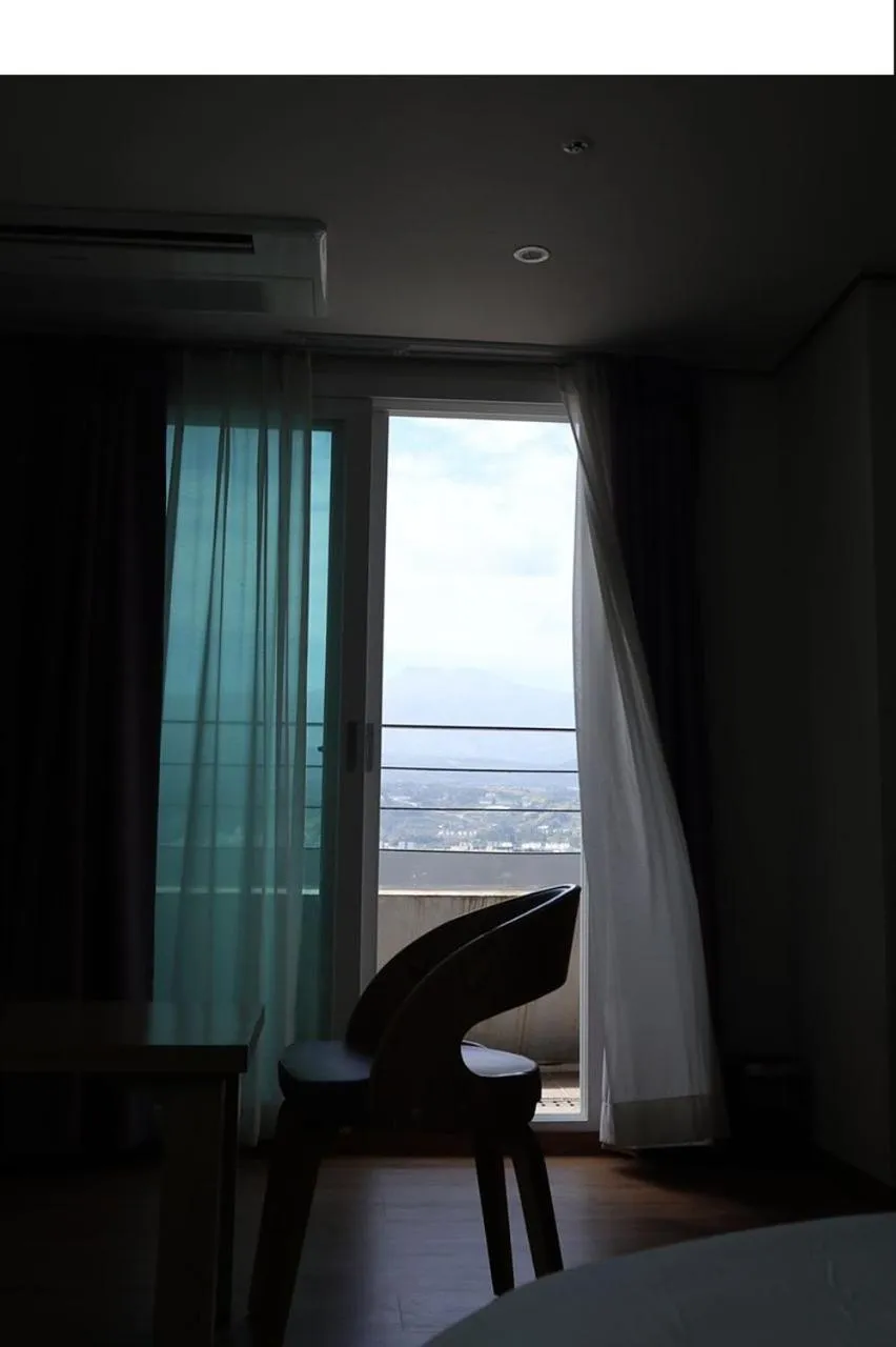 Photo of the whole room, Bed in Hotel Rest Seogwipo