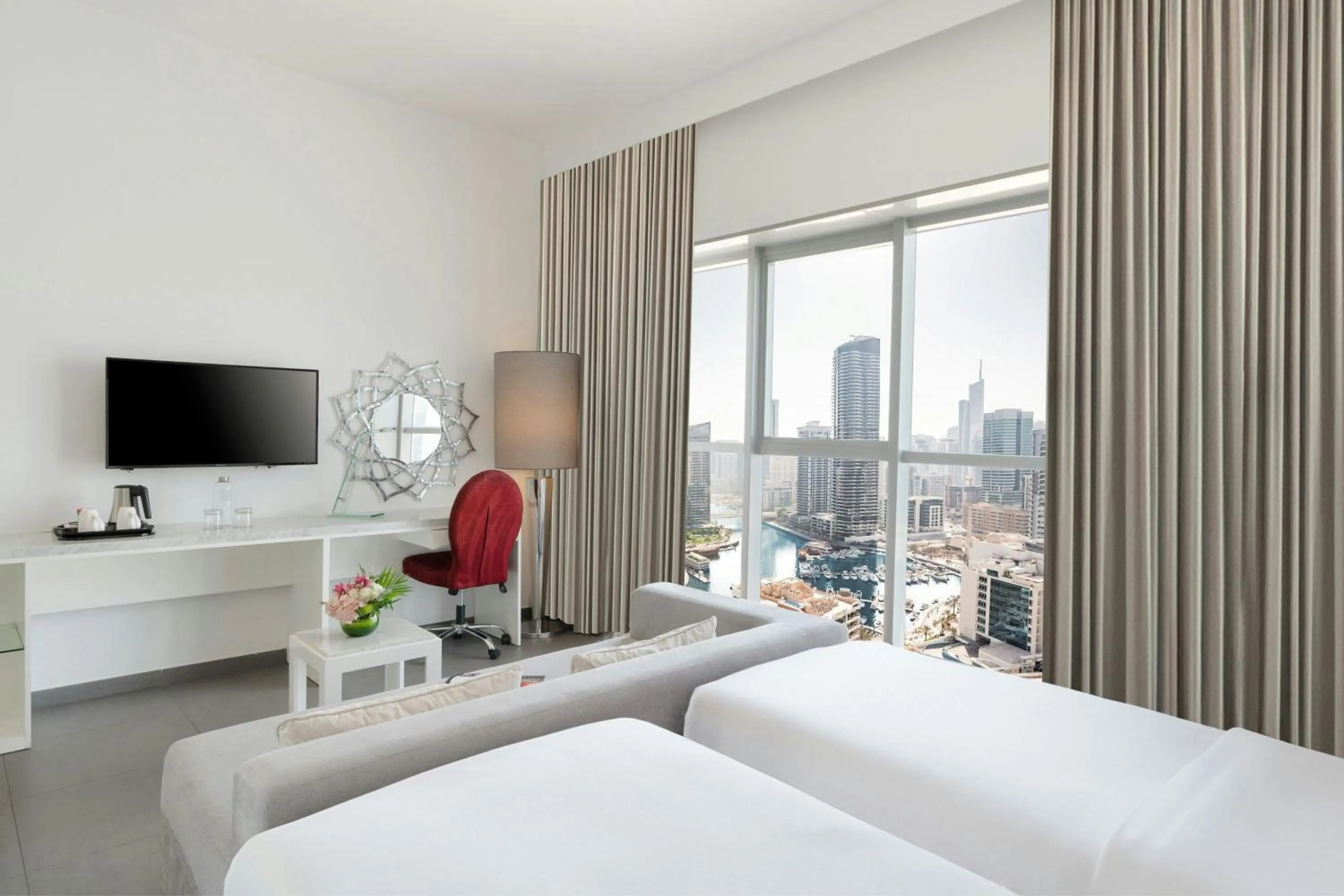 Photo of the whole room, Bed in The First Collection Marina, Dubai, a Tribute Portfolio Hotel