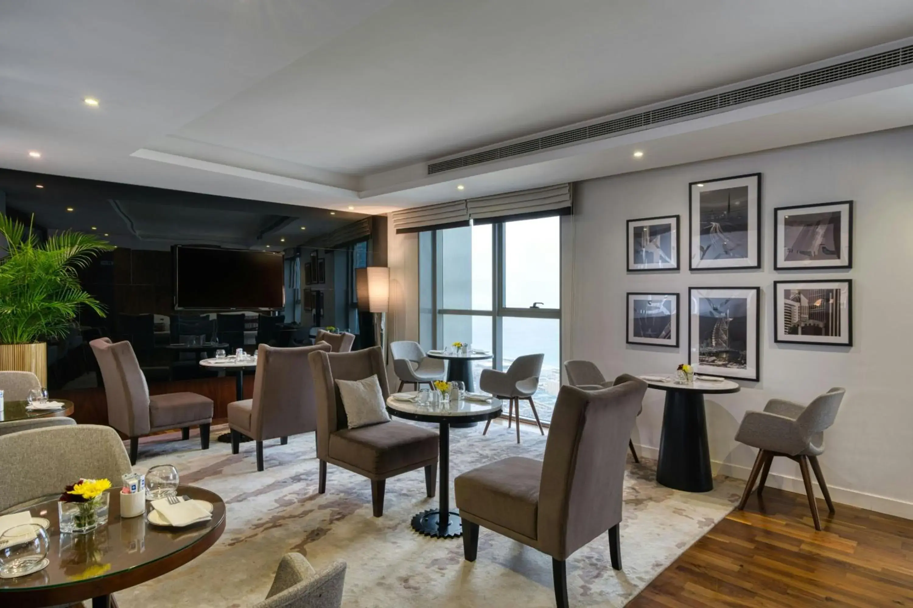 Lounge or bar in The First Collection Marina, Dubai, a Tribute Portfolio Hotel Lounge or bar in The First Collection Marina, Dubai, a Tribute Portfolio Hotel