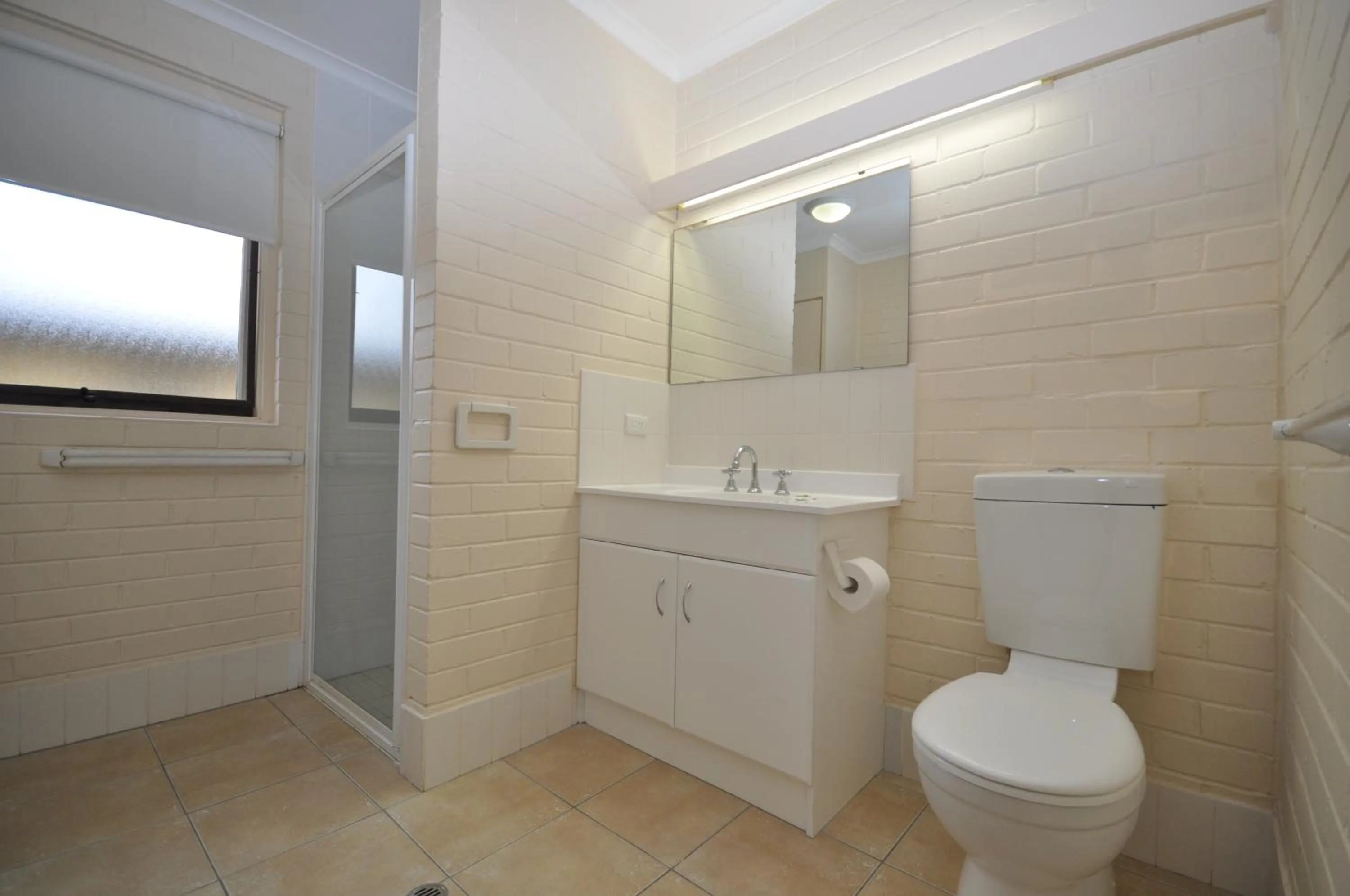 Bathroom in The Sands Holiday Apartments