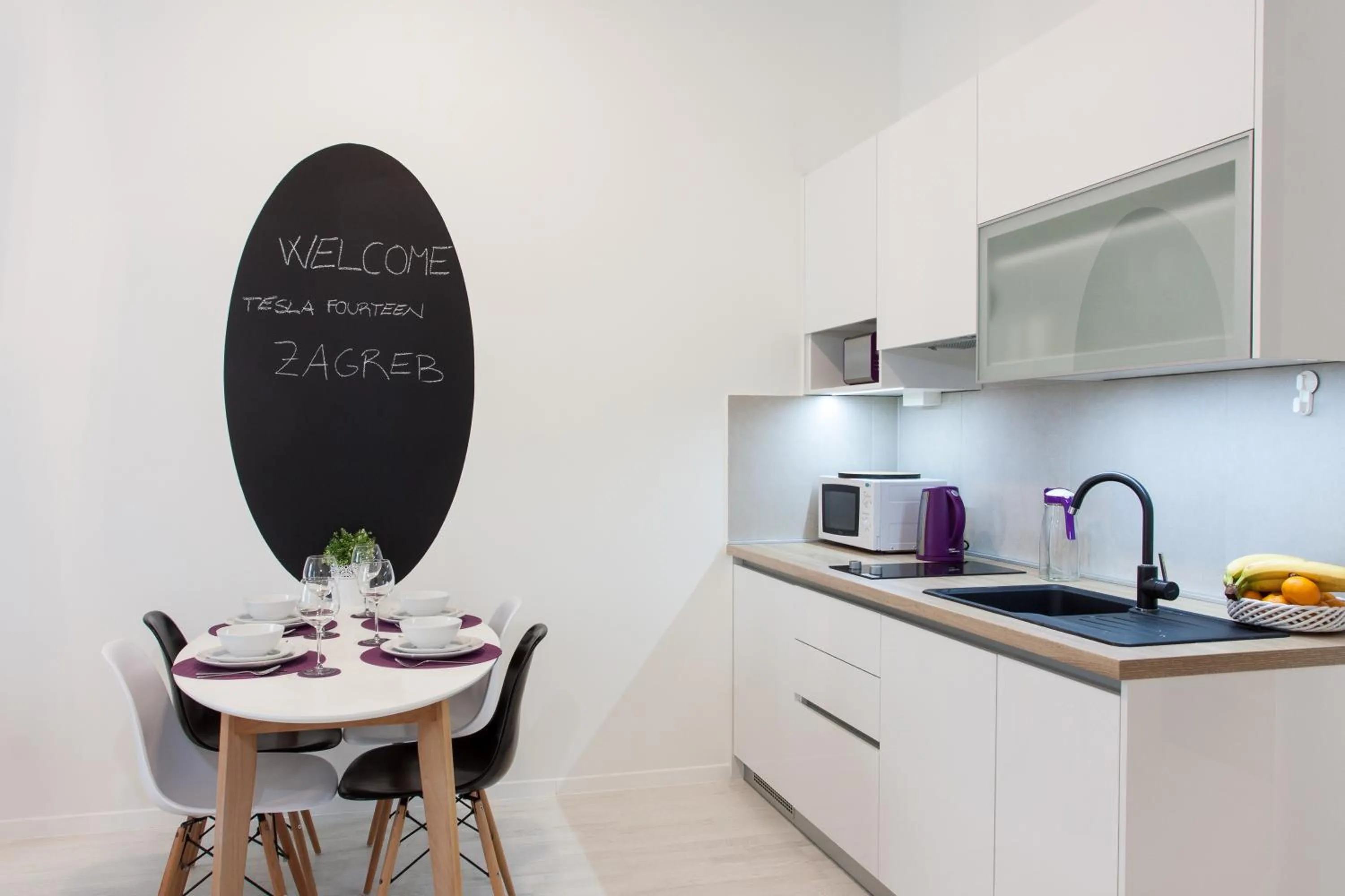 Kitchen or kitchenette in Tesla Boutique Apartments & Rooms