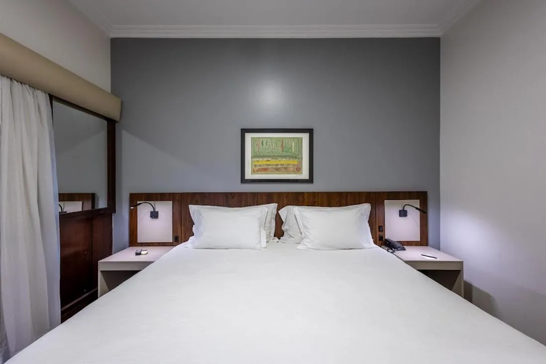 Bed in Plaza Blumenau Hotel