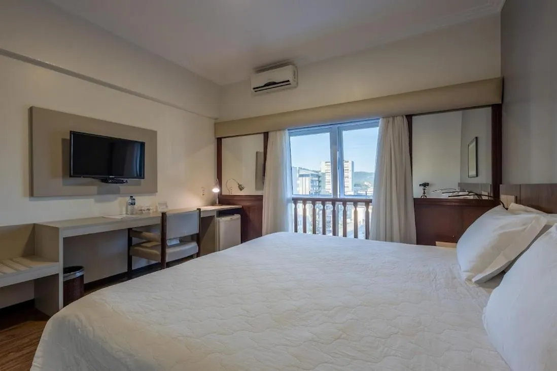 Bed in Plaza Blumenau Hotel