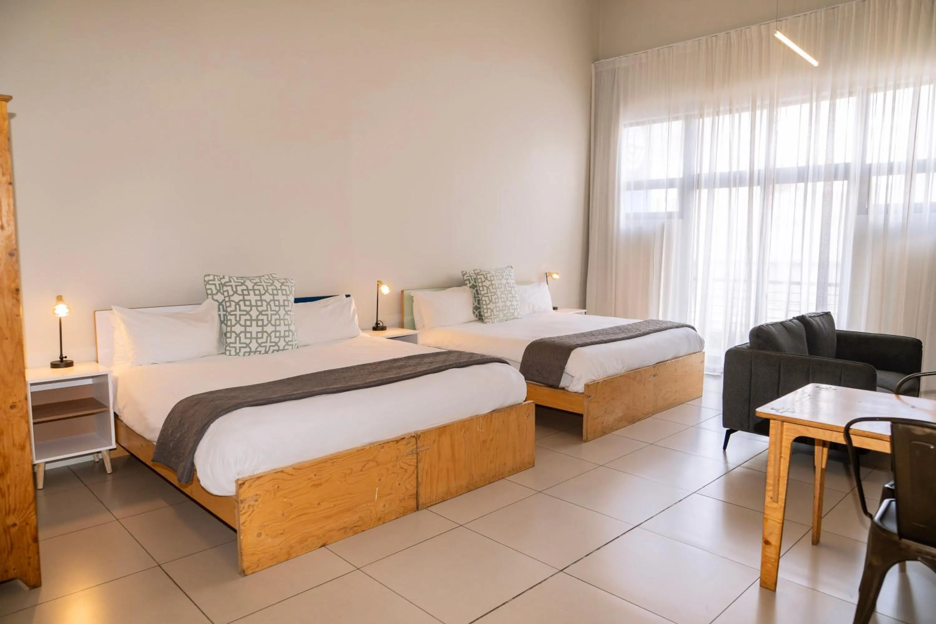 Photo of the whole room, Bed in Mojo Hotel & Market