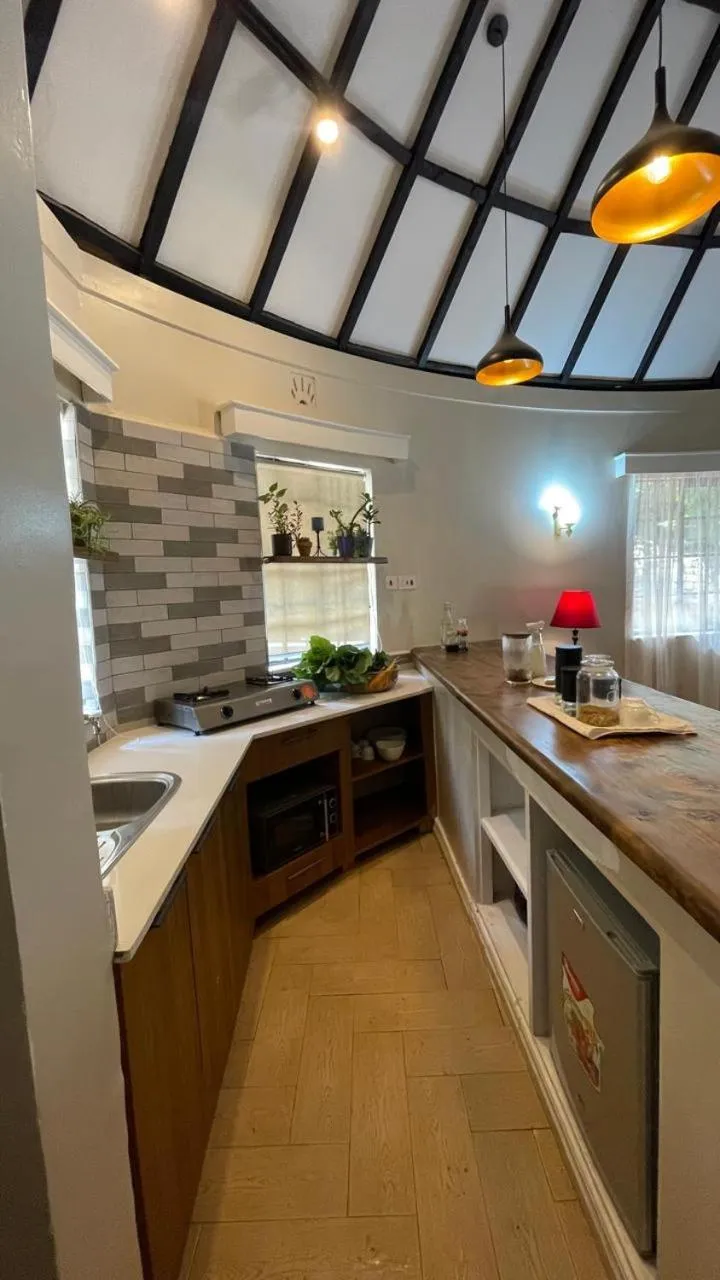 Kitchen or kitchenette in Thayu House