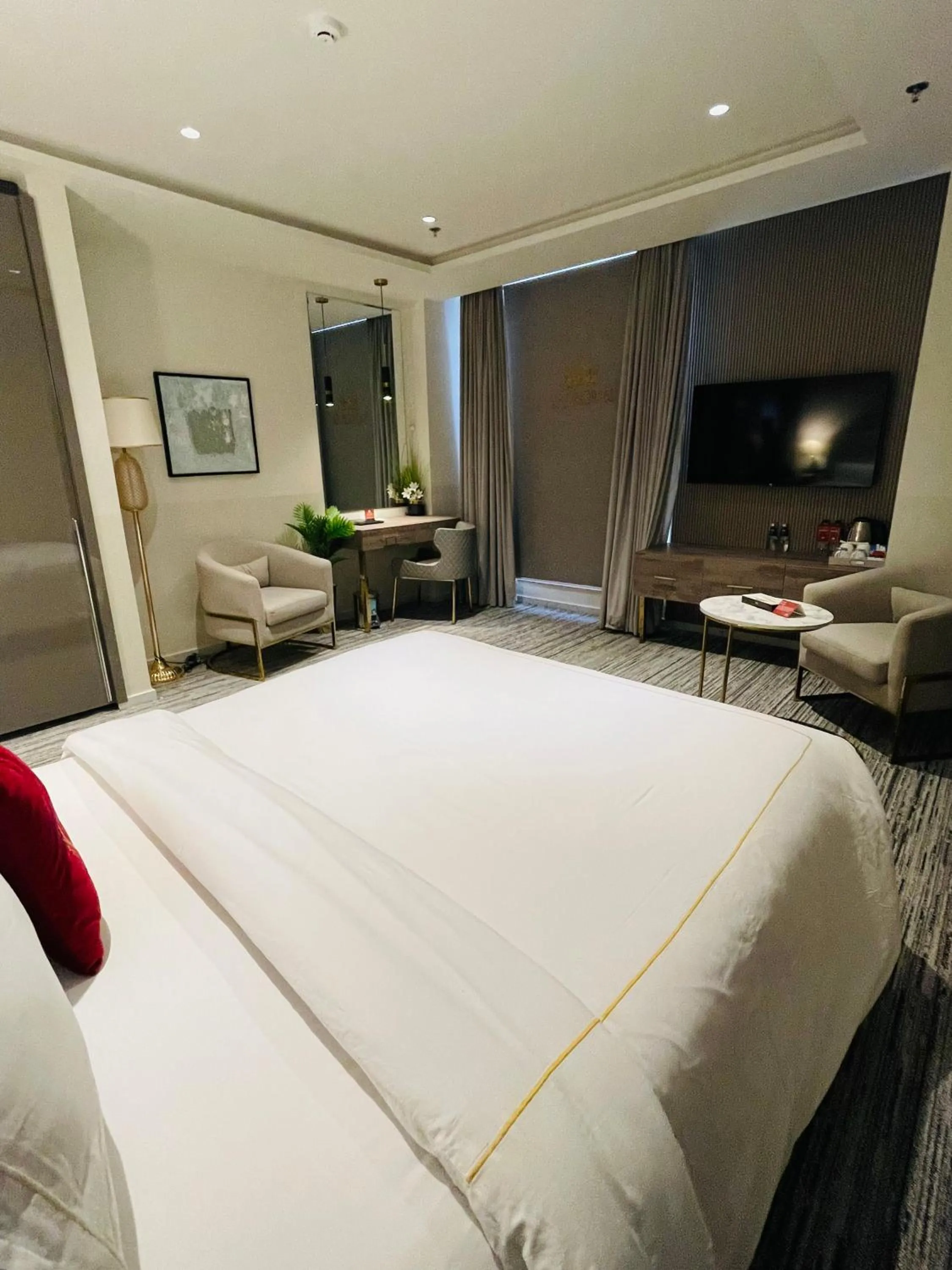 Bed in Taj Signature Hotel Islamabad