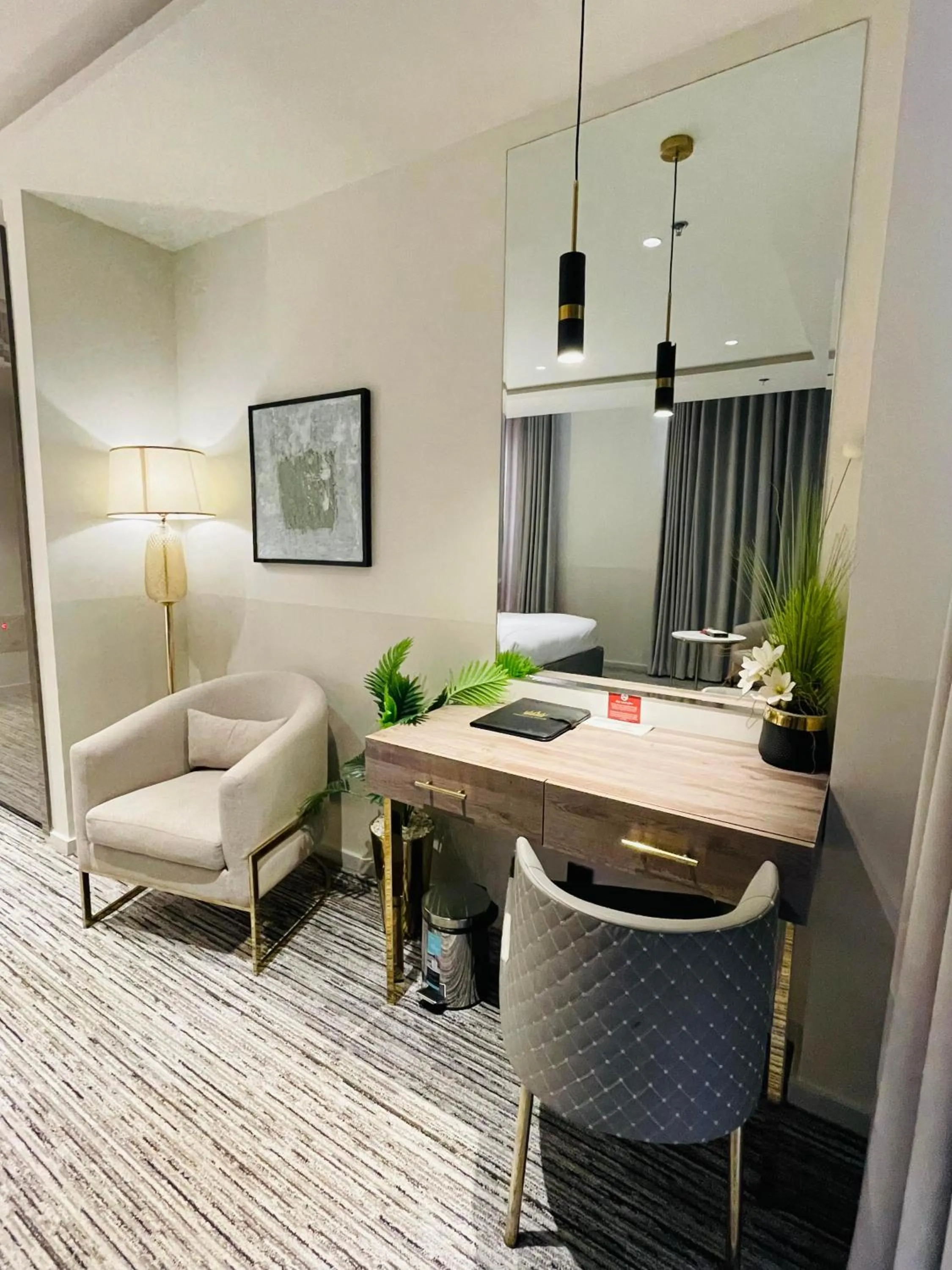 Seating area, Bed in Taj Signature Hotel Islamabad