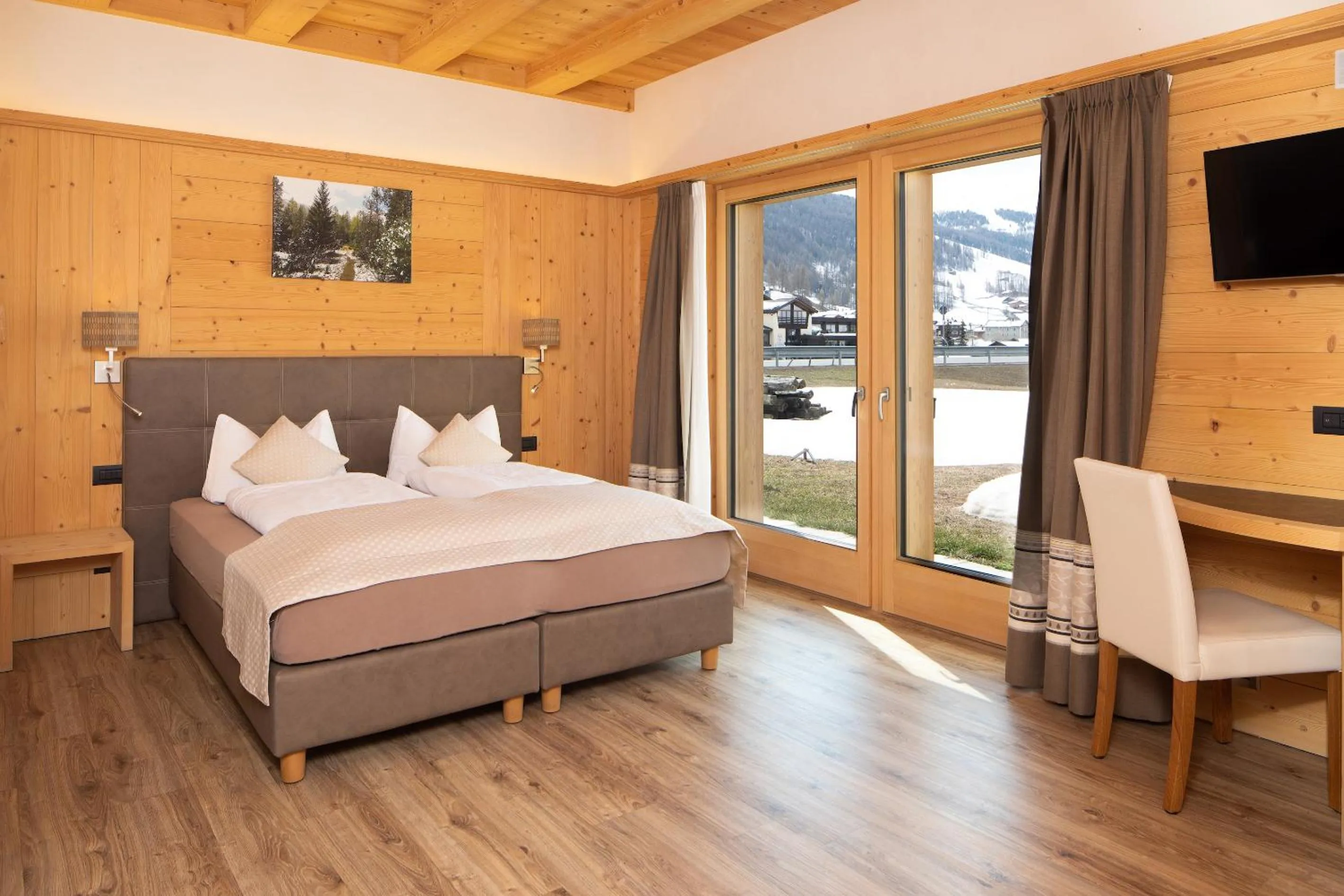 Bed in B&B Ecohotel Chalet des Alpes