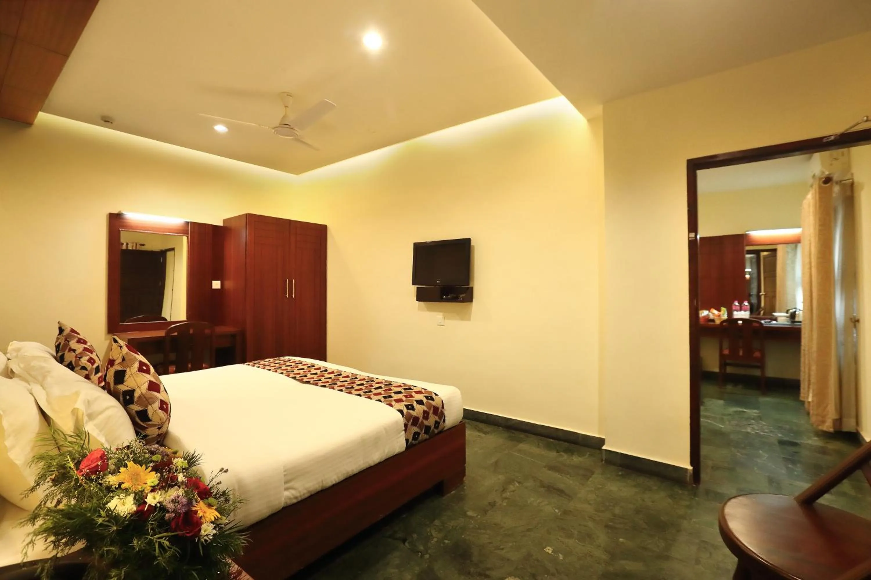 Bed in Hotel Indraprastha varkala