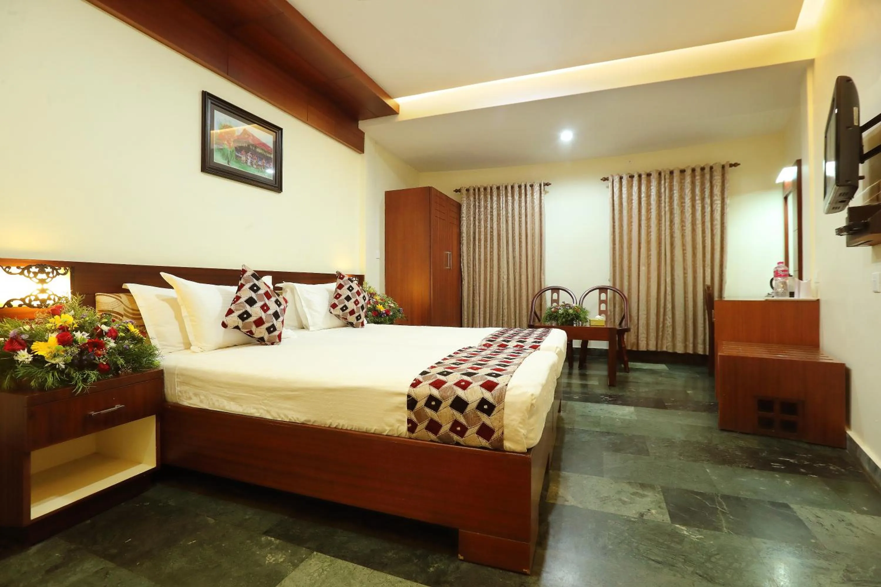 Bed in Hotel Indraprastha varkala