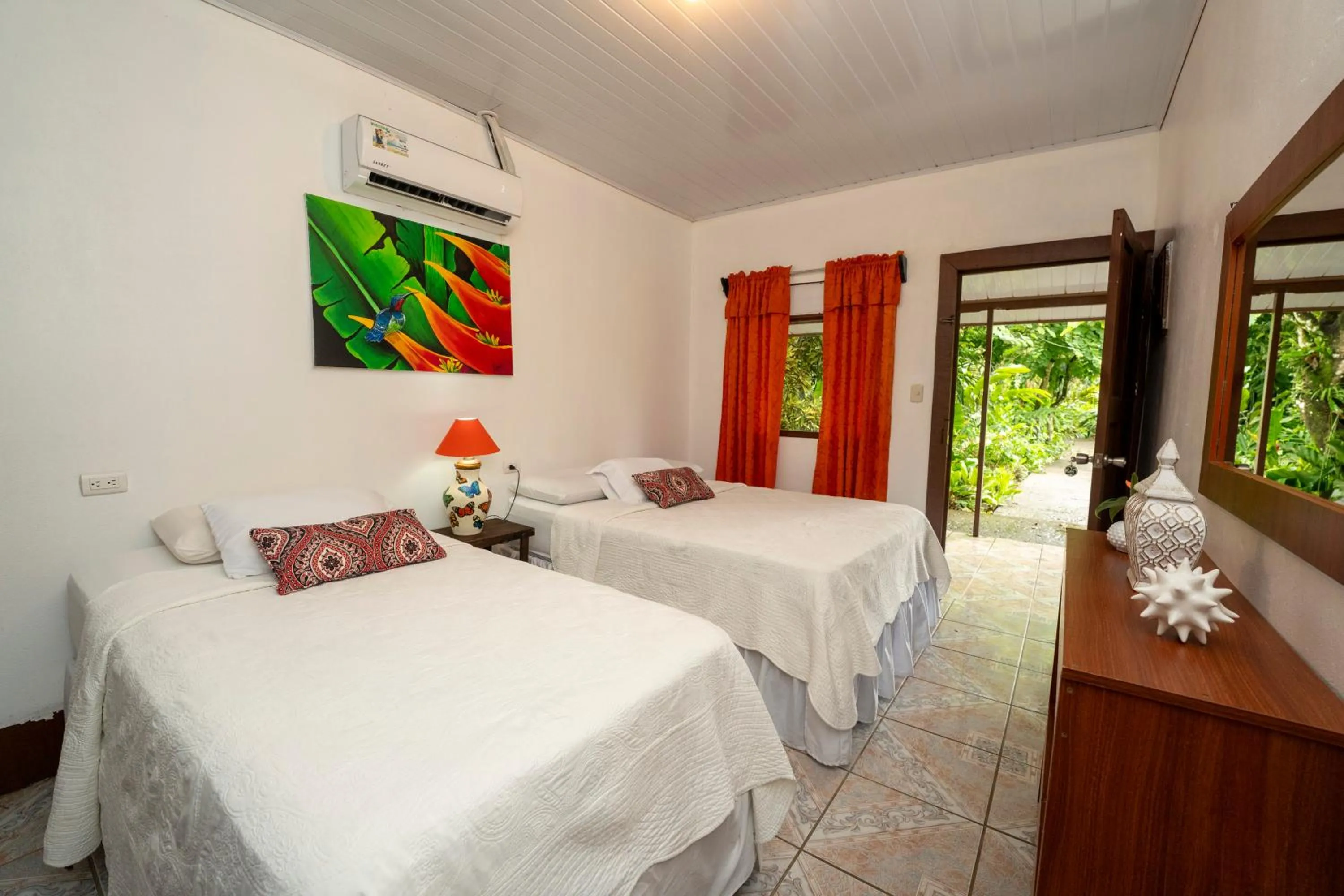 Bed in Hotel Tortuguero Beachfront
