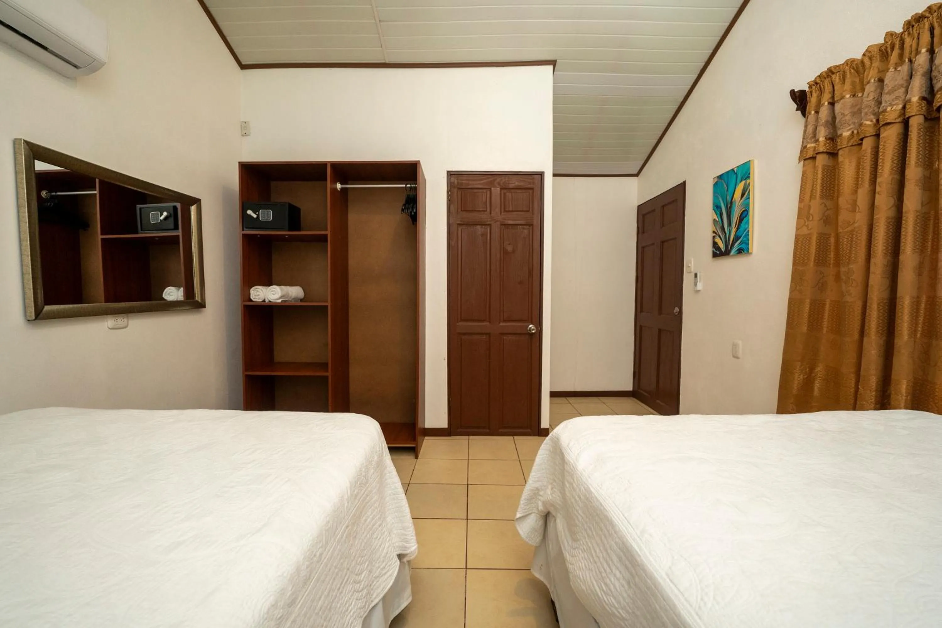 Bed in Hotel Tortuguero Beachfront