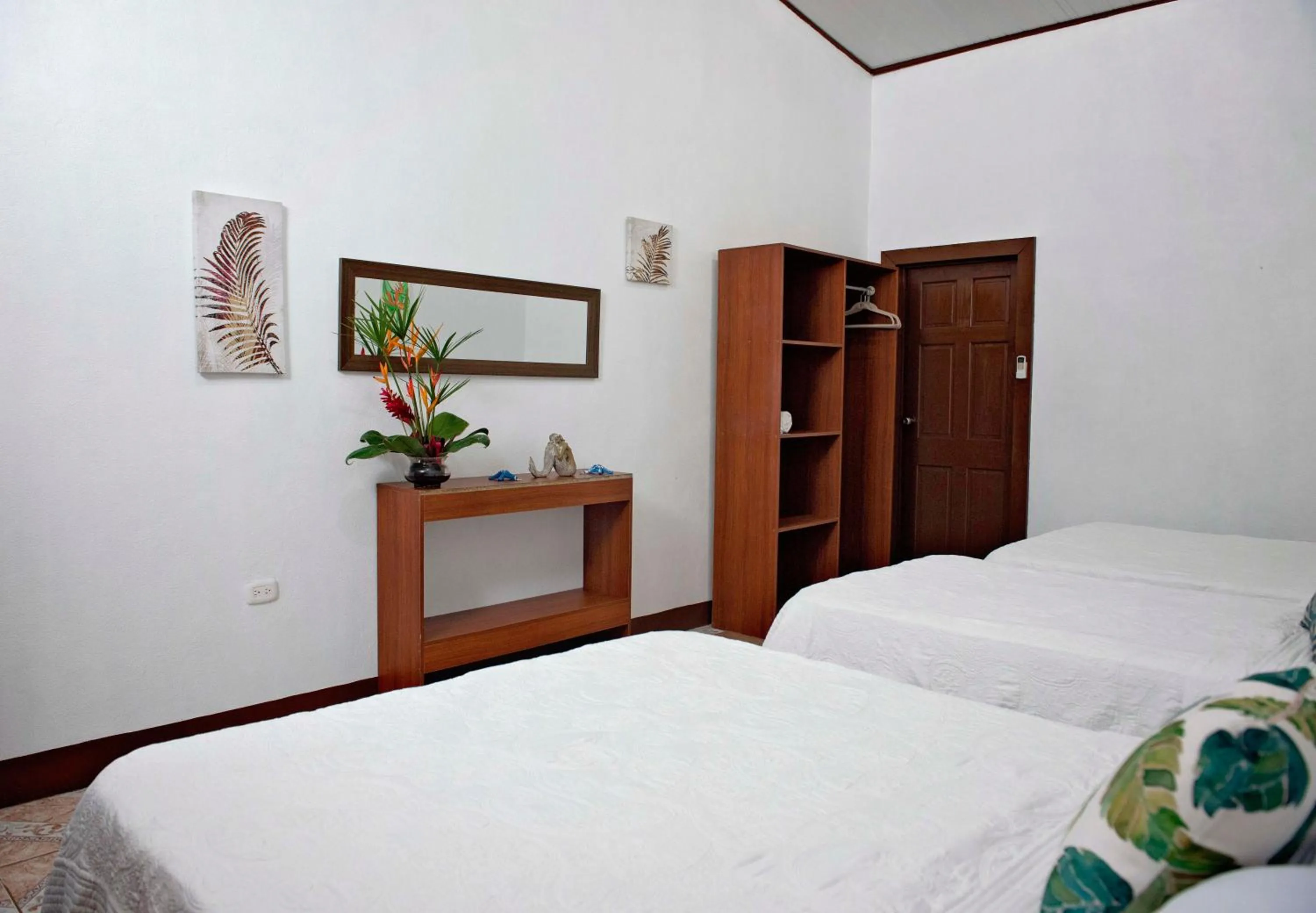 Bed in Hotel Tortuguero Beachfront