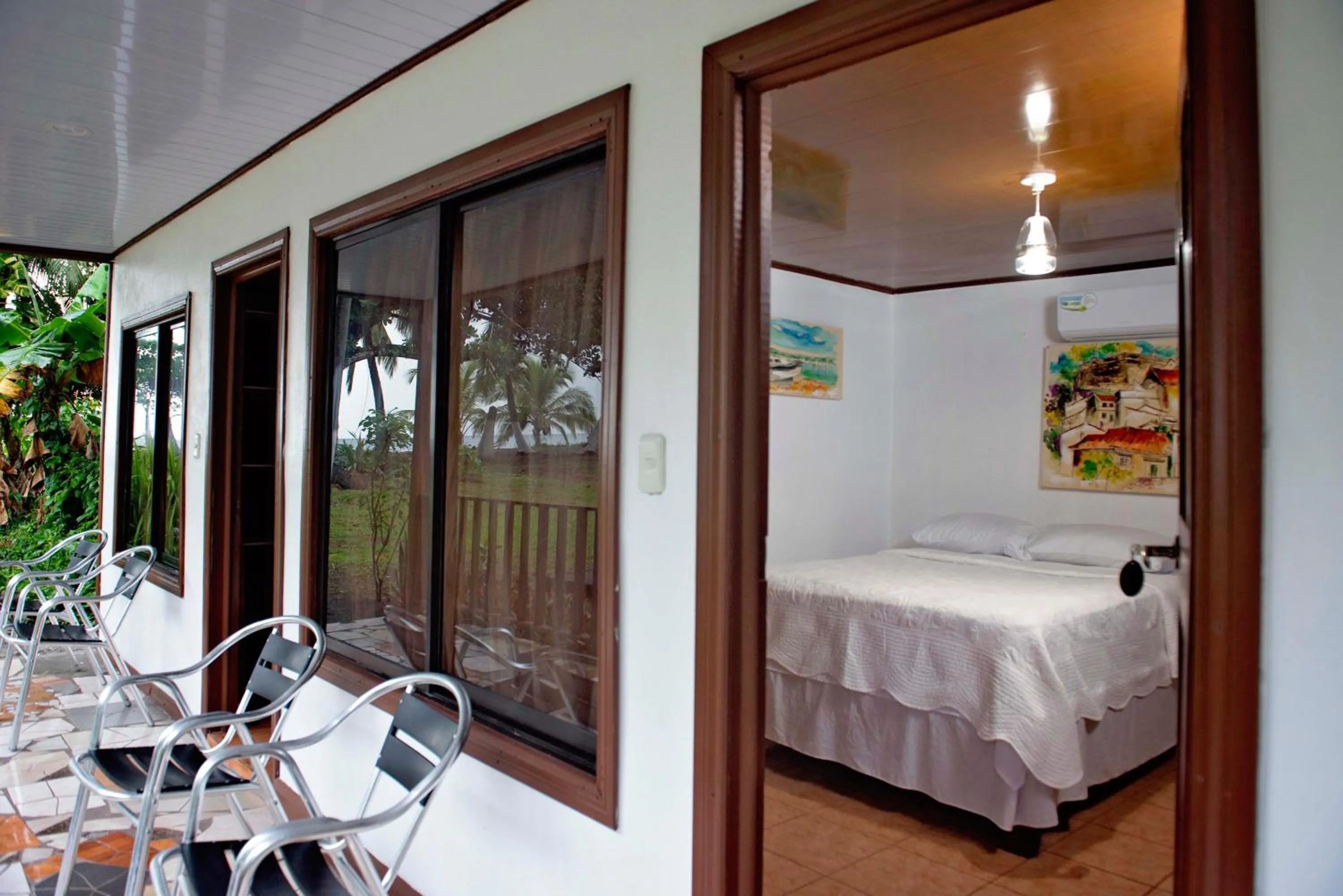 Bedroom, Bed in Hotel Tortuguero Beachfront