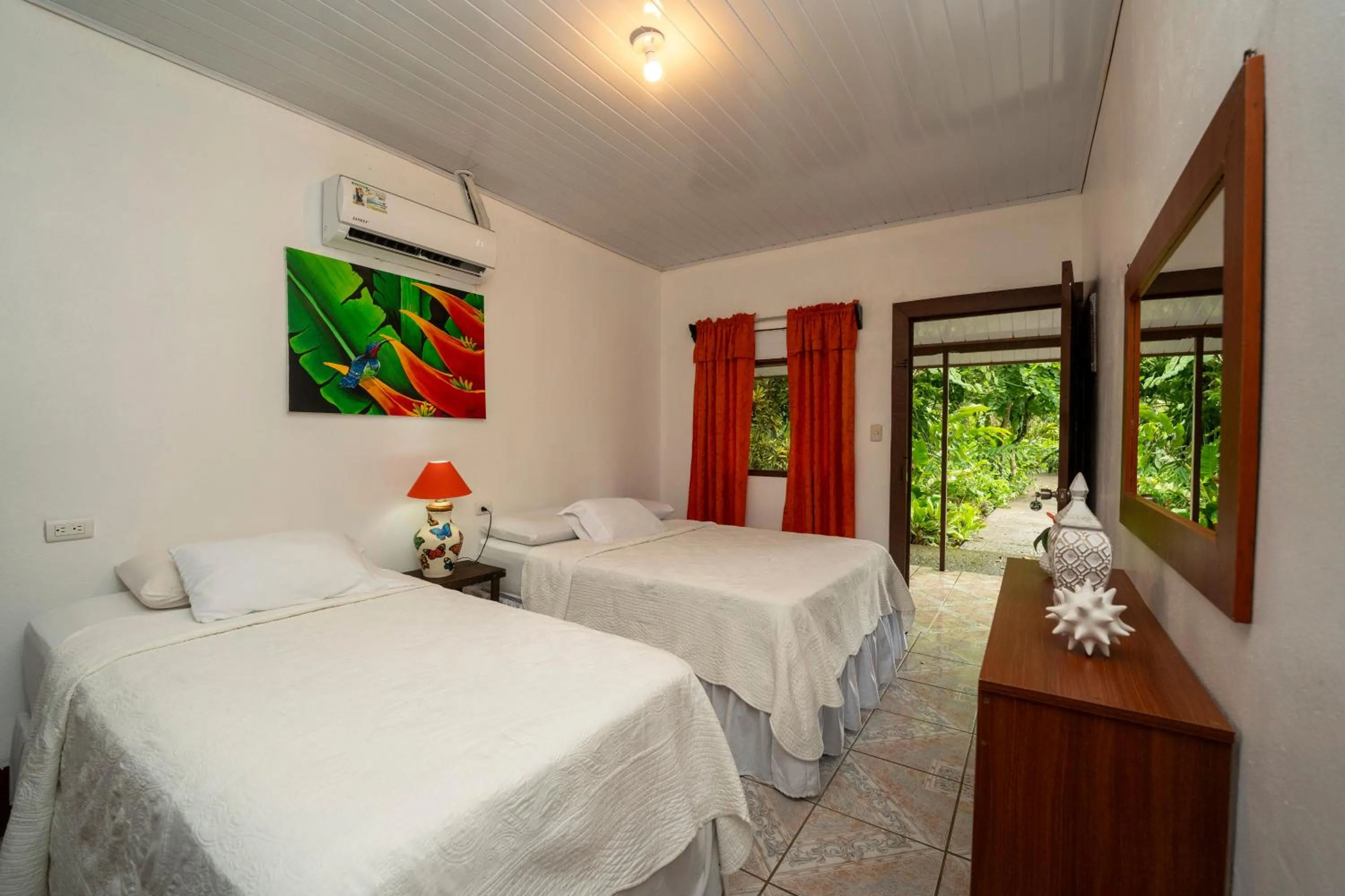 Bed in Hotel Tortuguero Beachfront